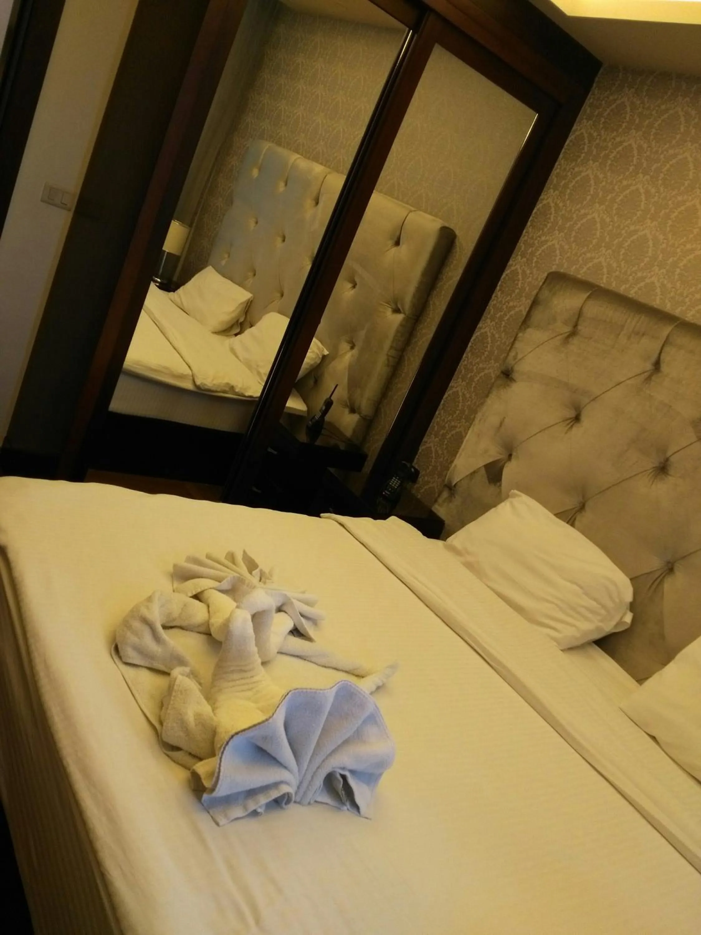 Bedroom, Bed in Nadine Hotel Suites