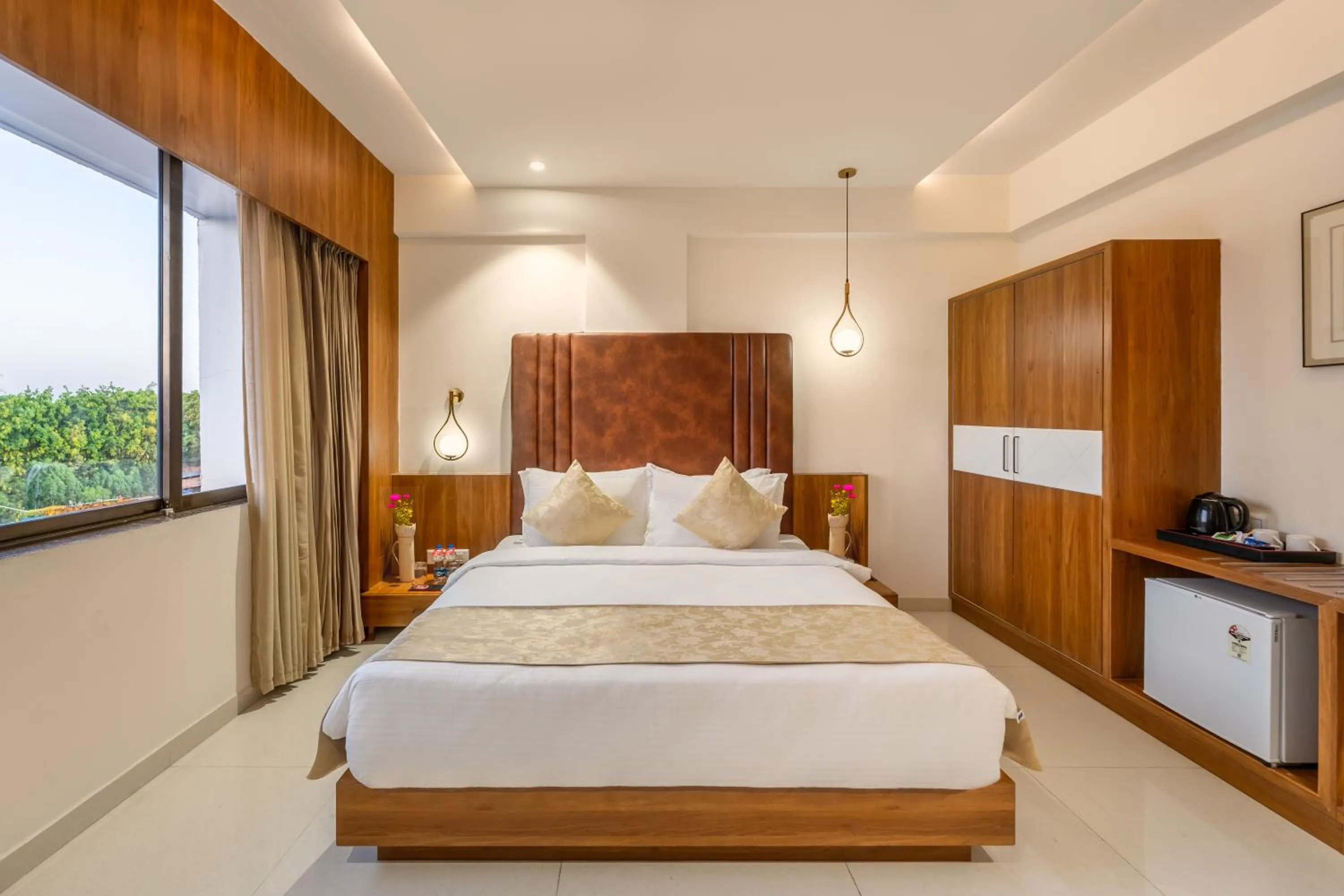 Bed in Lords Eco Inn, Ambaji