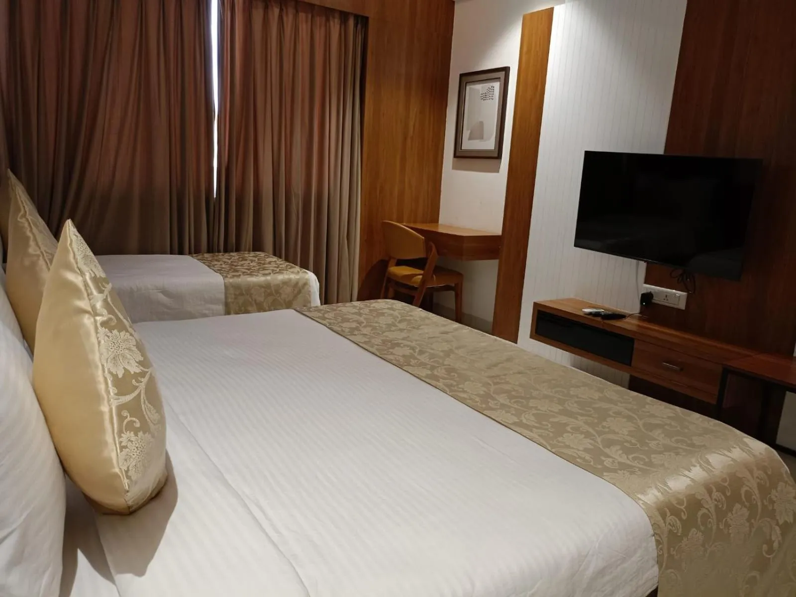 Bed in Lords Eco Inn, Ambaji