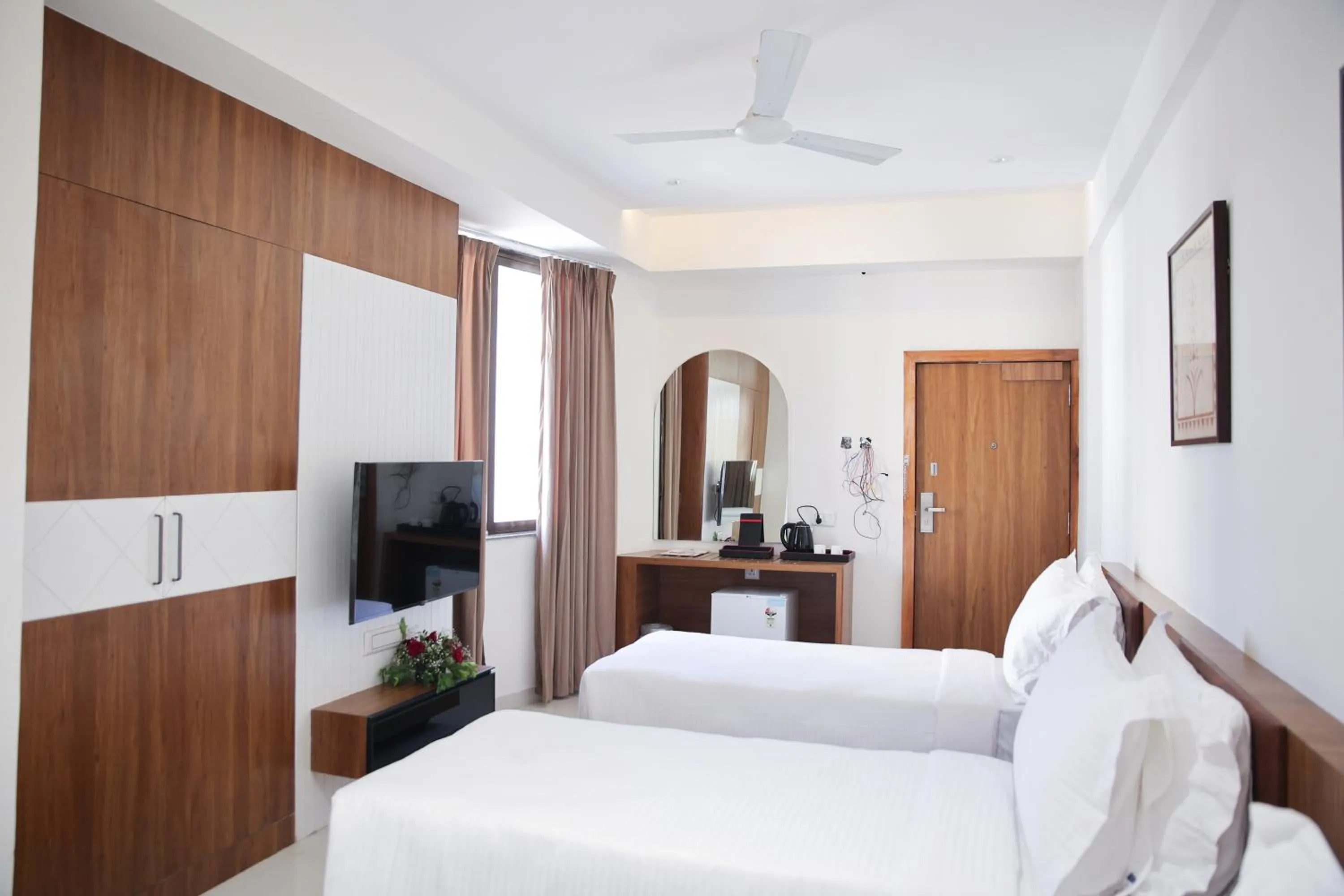 Bed in Lords Eco Inn, Ambaji