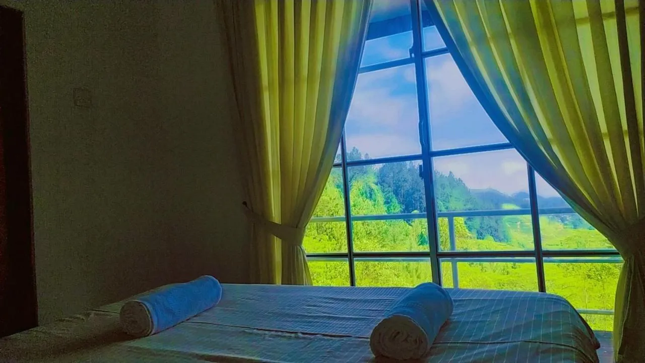 Bed in Lassana Holiday Bungalow