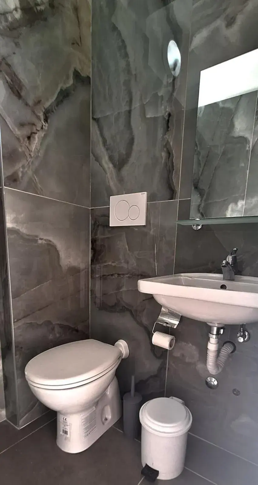 Bathroom in Hotel Busignani