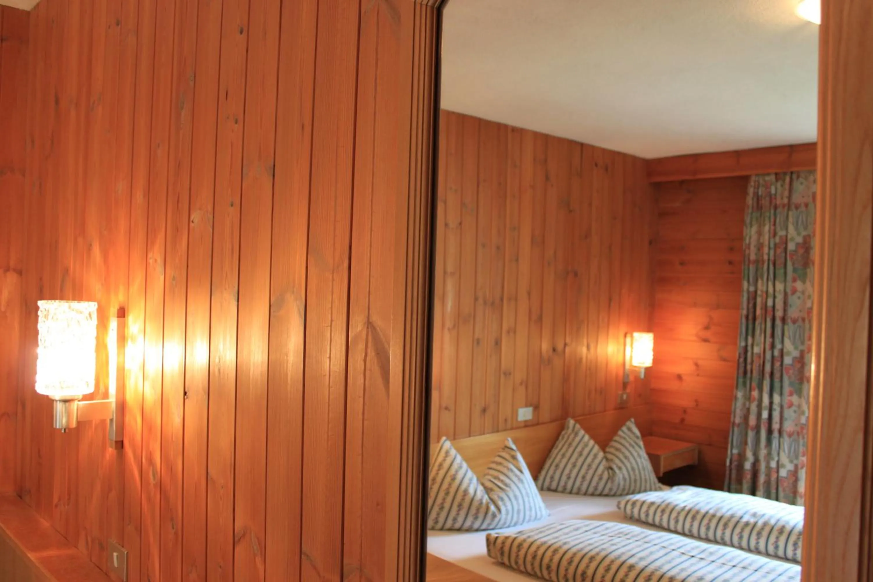 Decorative detail, Bed in Albergo Alisander