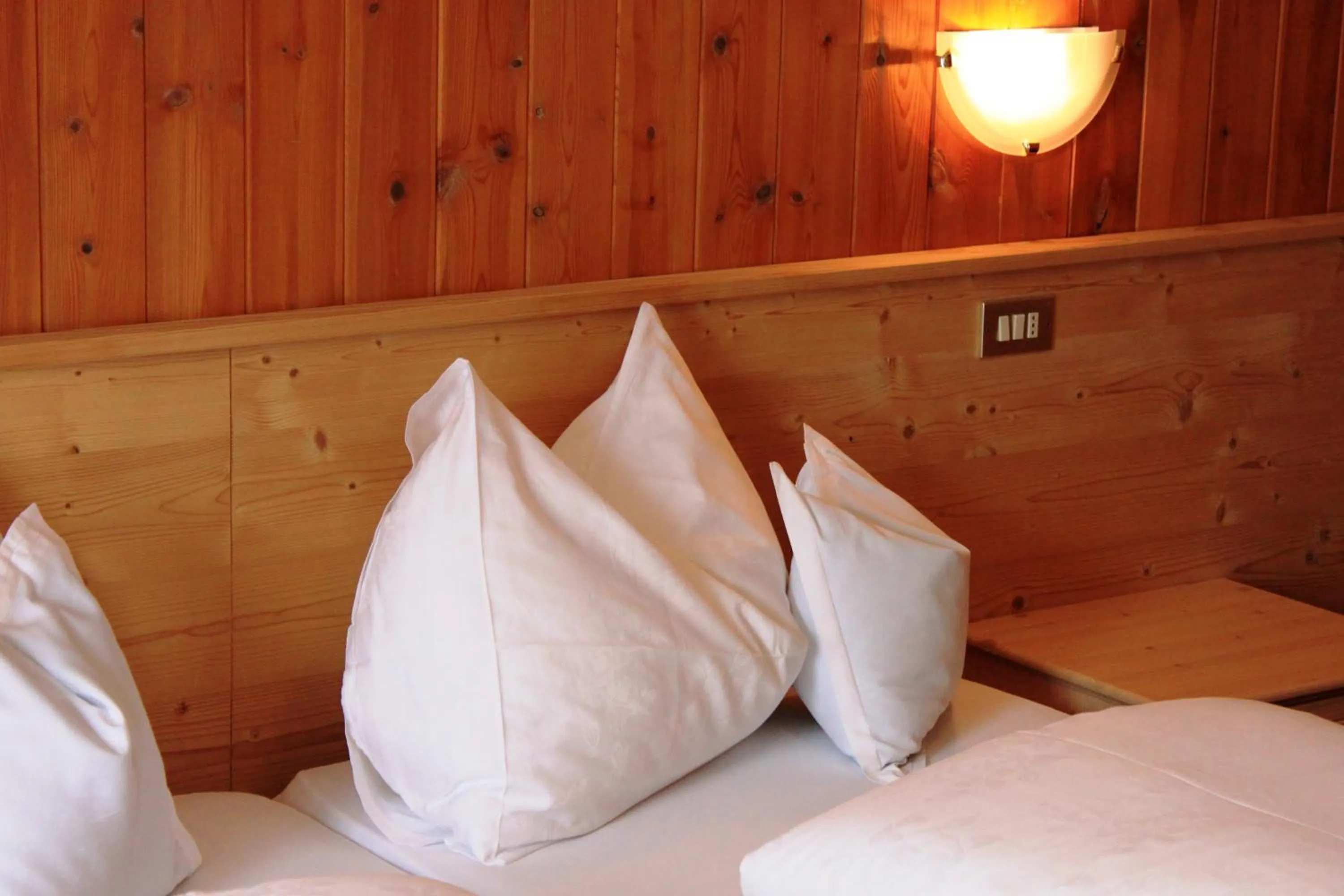 Bed in Albergo Alisander