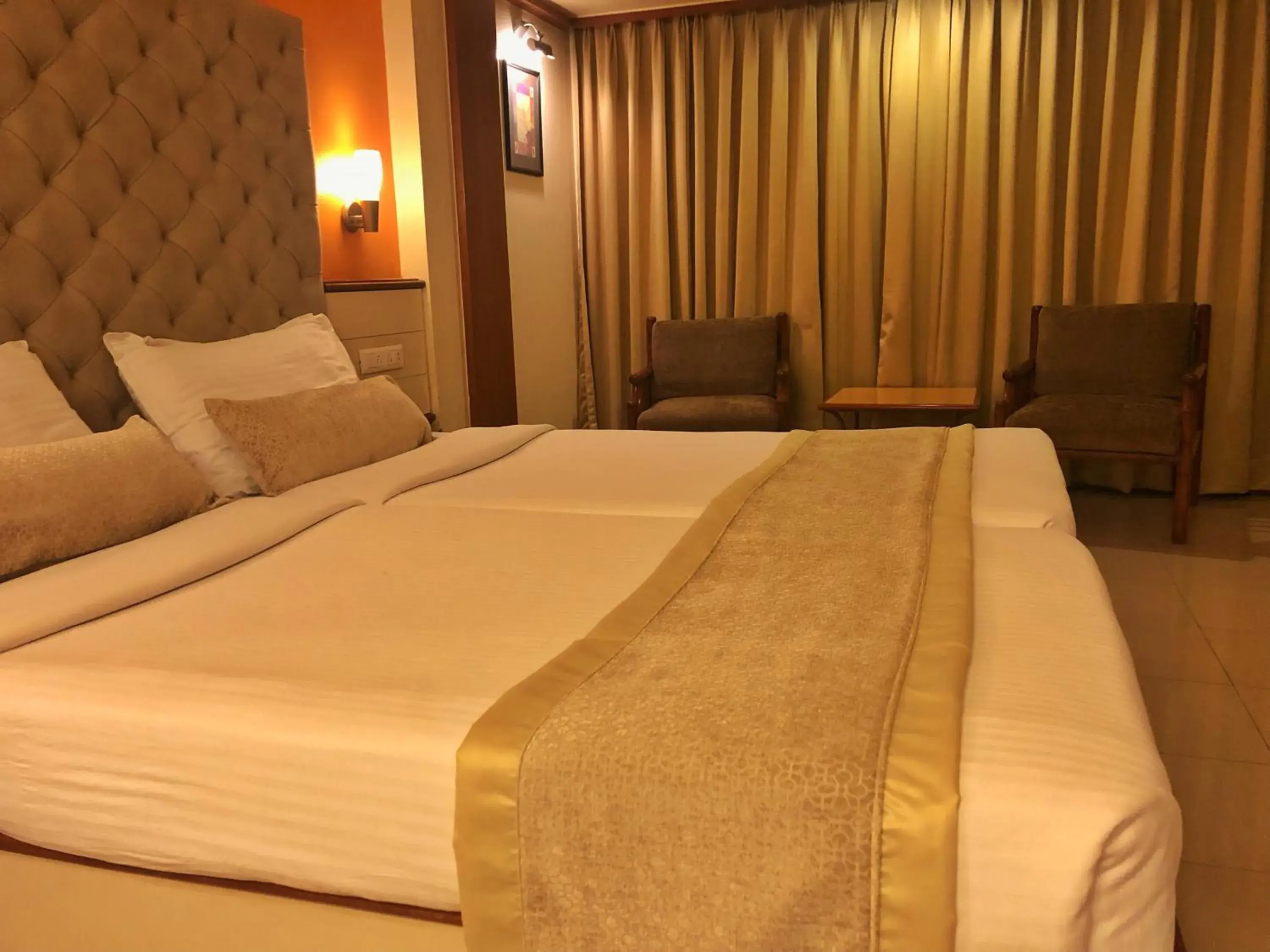 Bedroom, Bed in Hotel Shree Panchratna Pune Bedroom, Bed in Hotel Shree Panchratna Pune