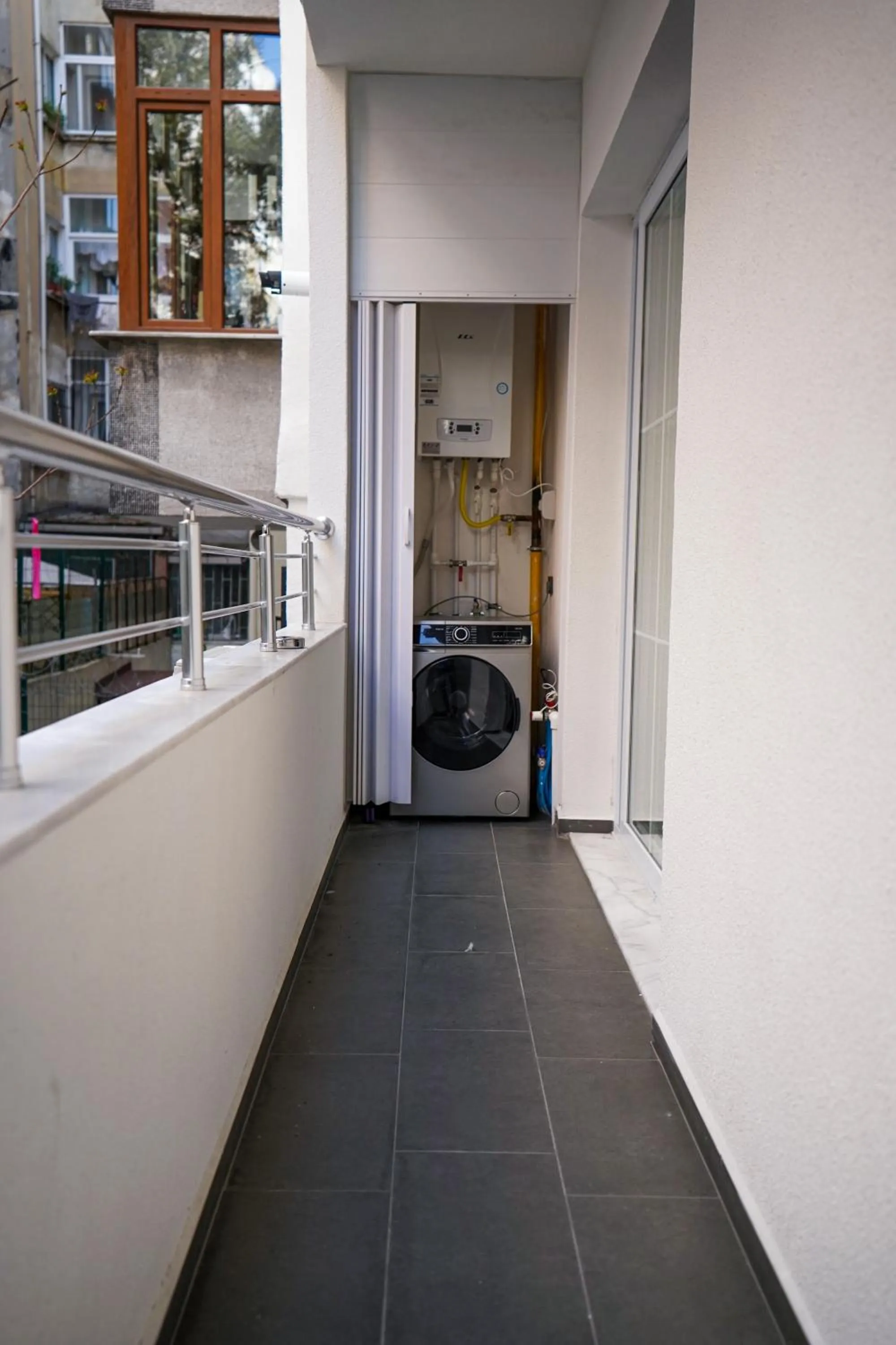 washing machine in Merkuri apartments