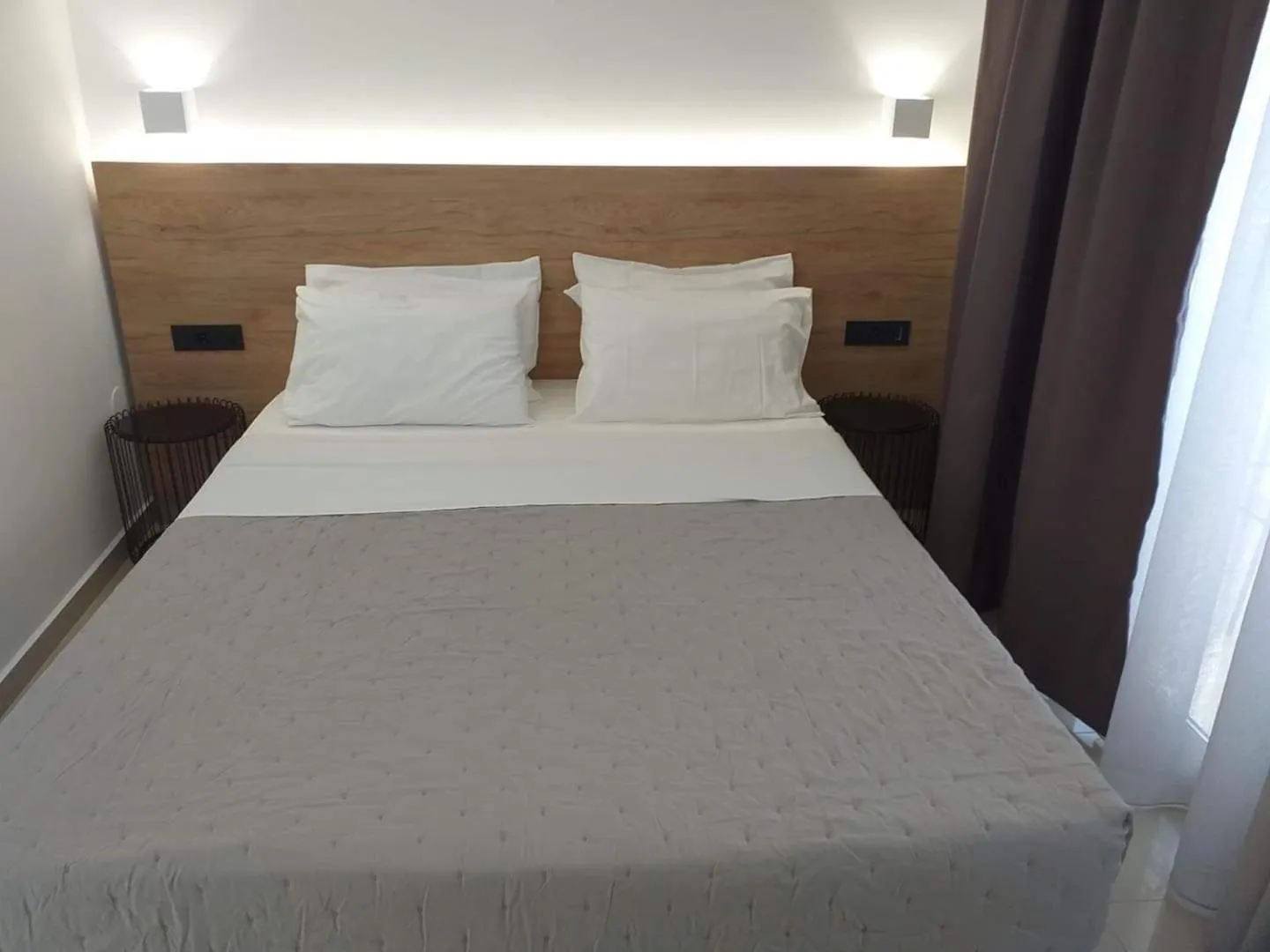 Bed in Aestas Apartments