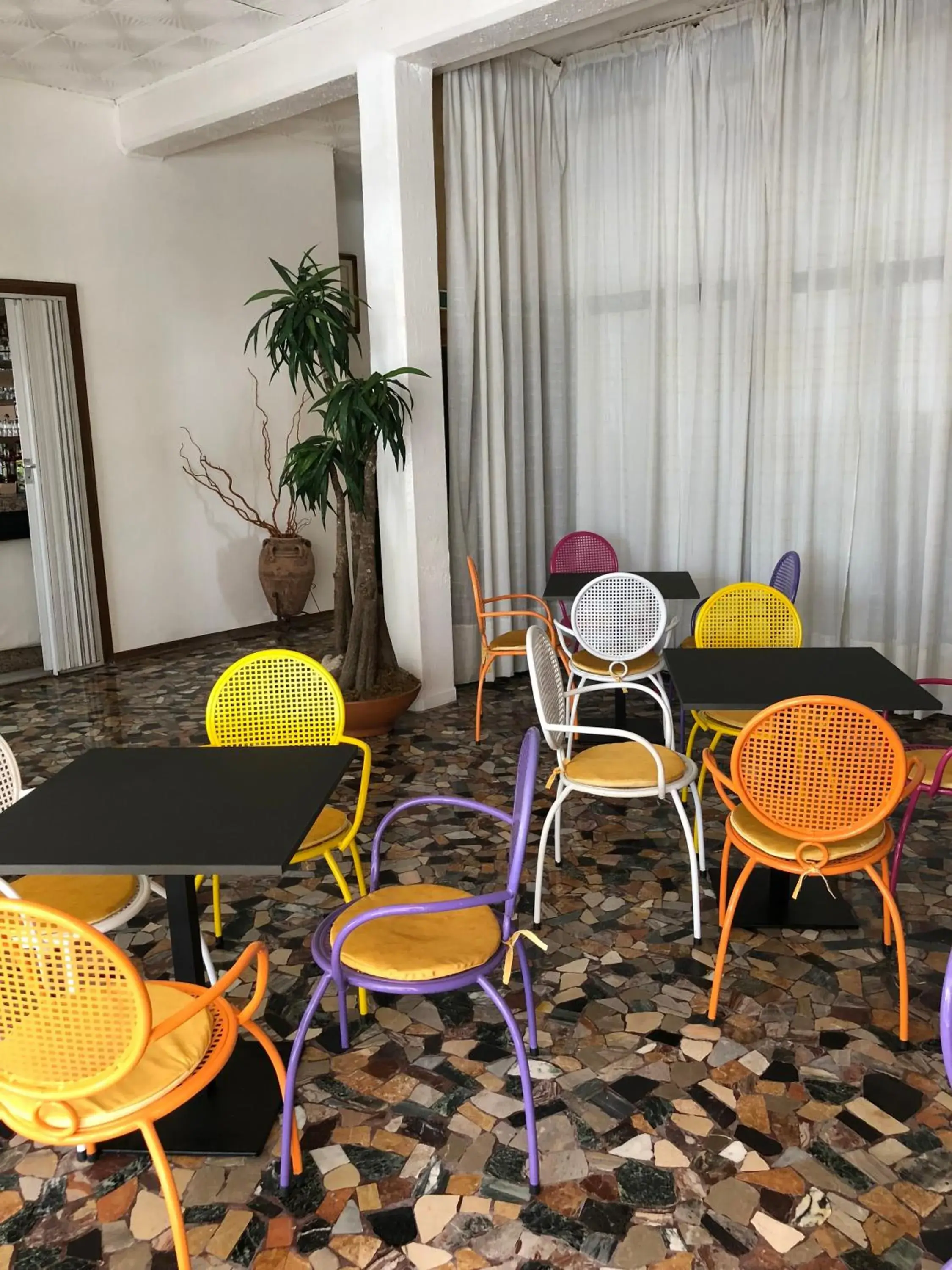 Communal lounge/ TV room in Hotel Marlisa Pier