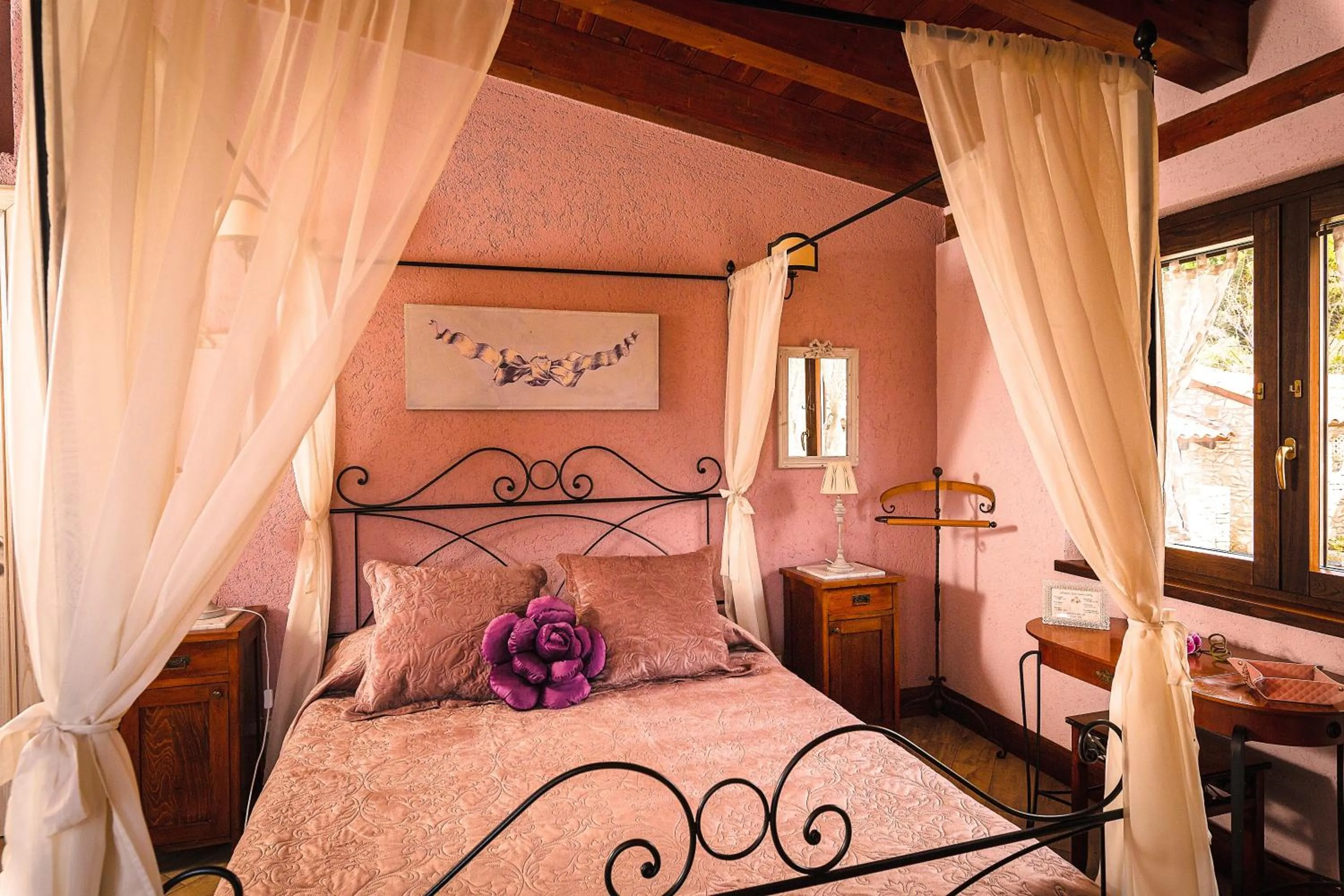 Bed in Relais Garden Cactus B&B