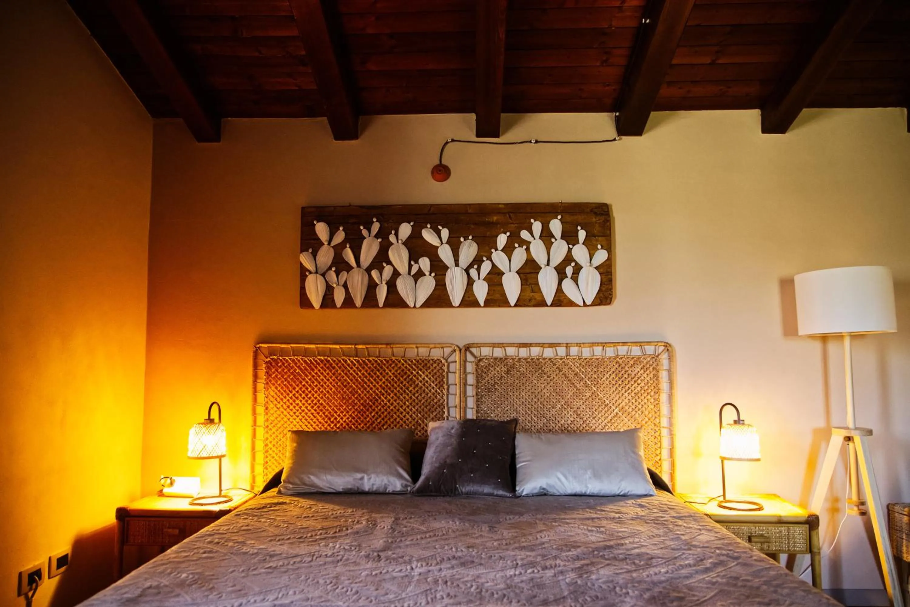 Bed in Relais Garden Cactus B&B