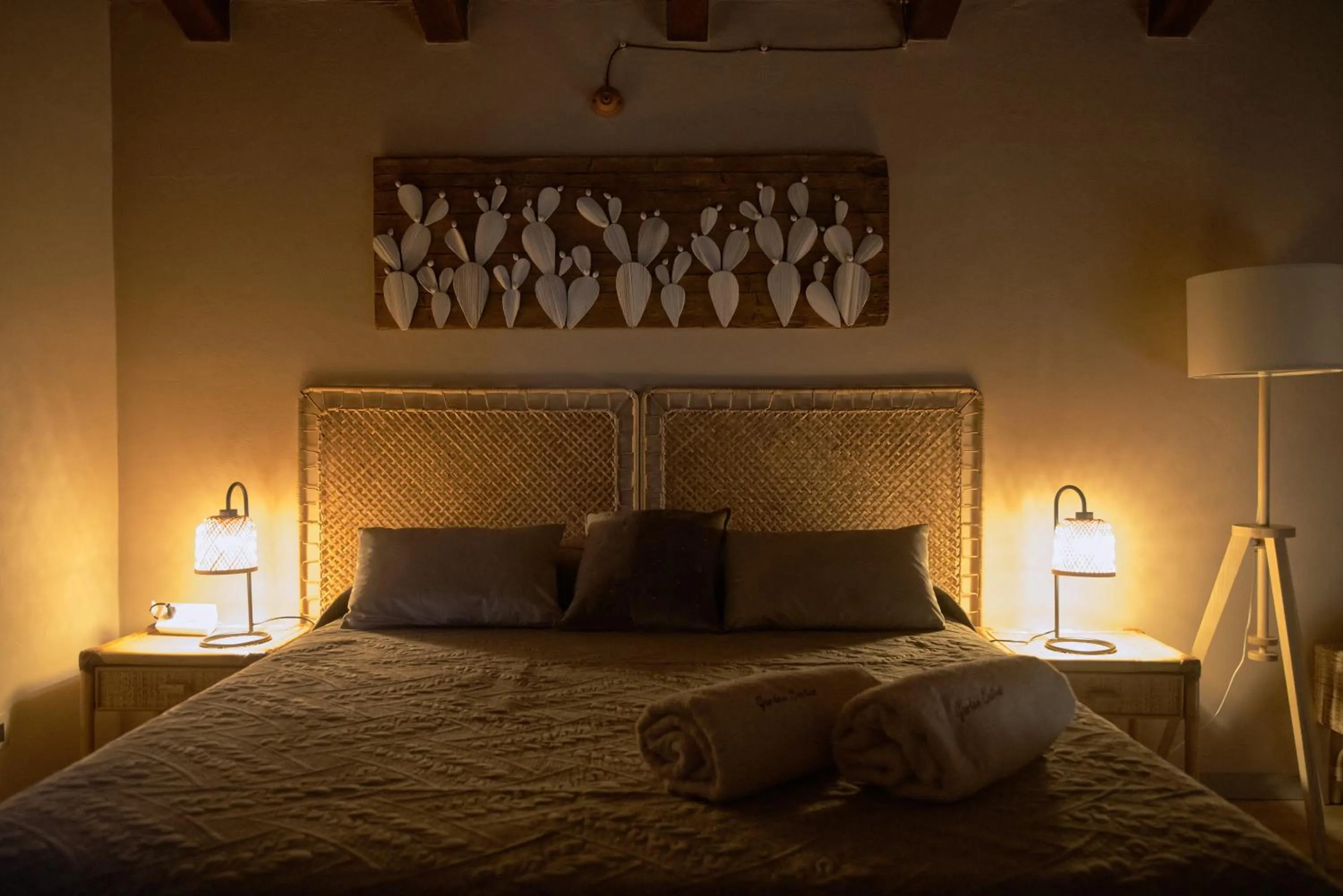 Bed in Relais Garden Cactus B&B