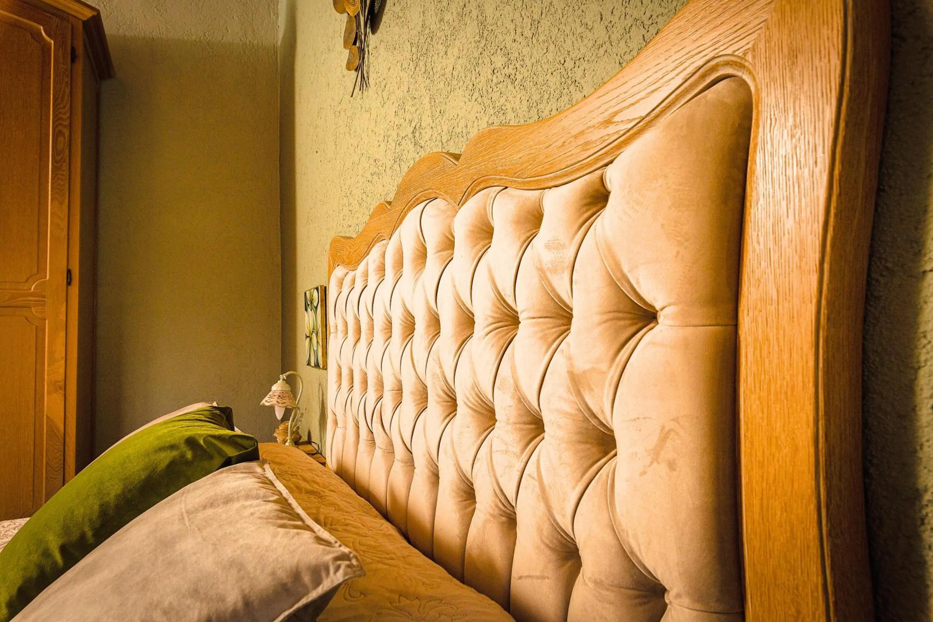 Bed in Relais Garden Cactus B&B