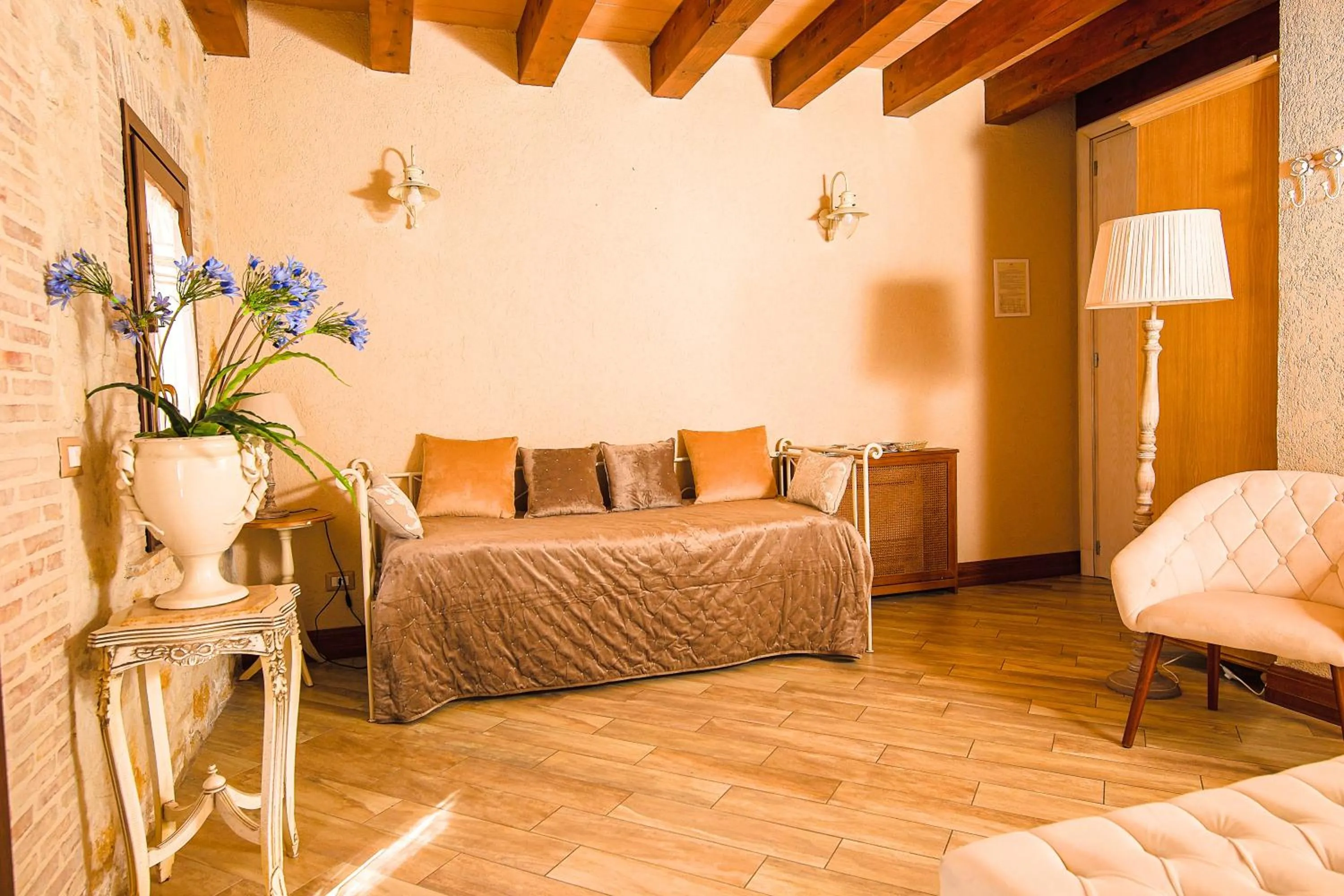 Bed in Relais Garden Cactus B&B