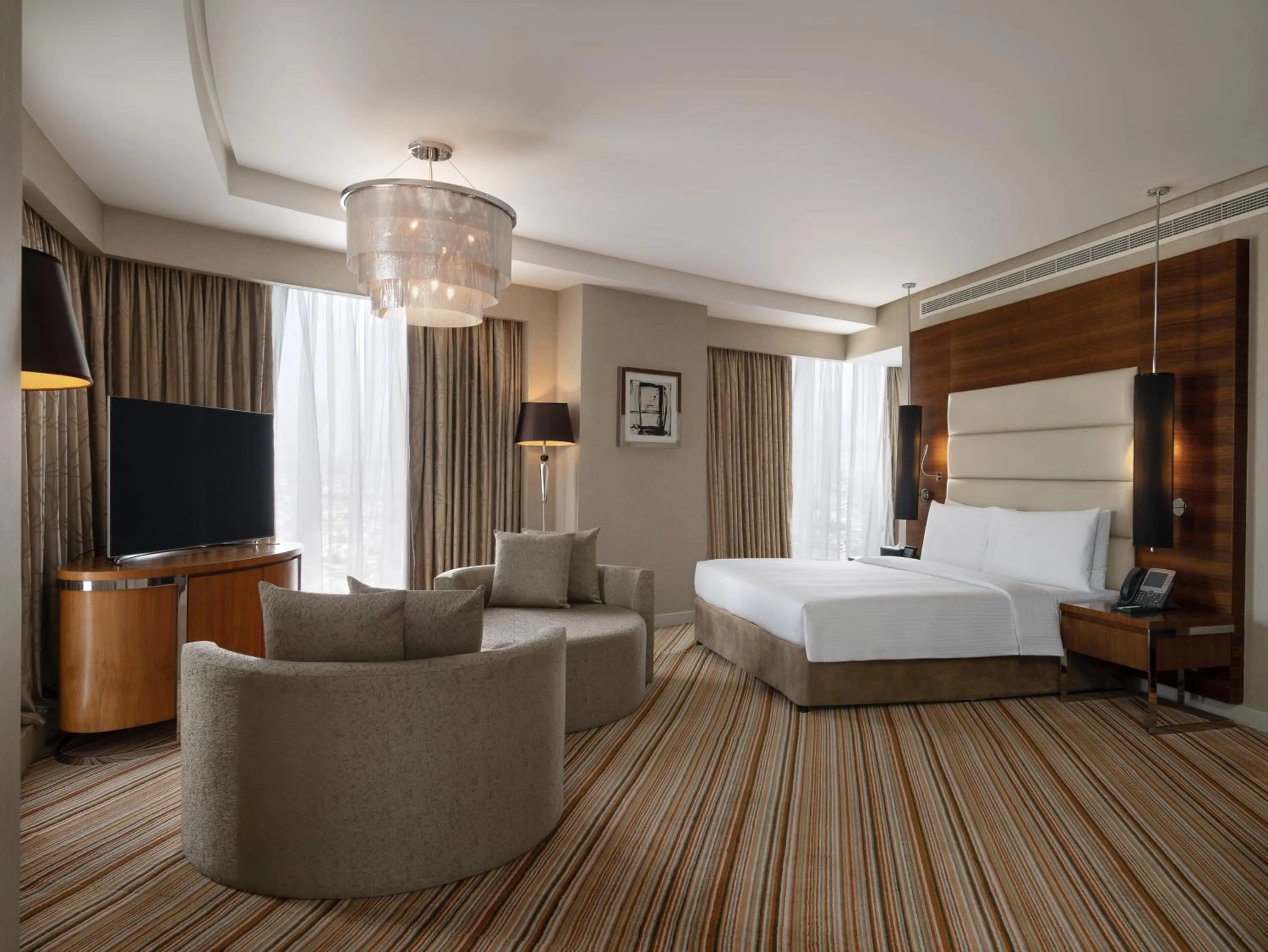 Bed in Grand Millennium Sulaimani