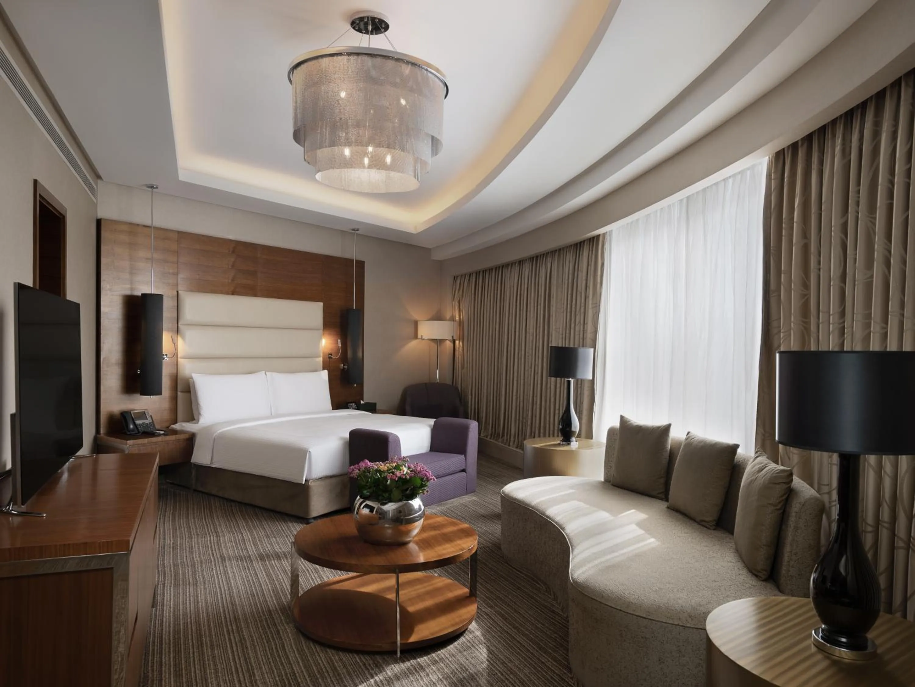 Bed in Grand Millennium Sulaimani