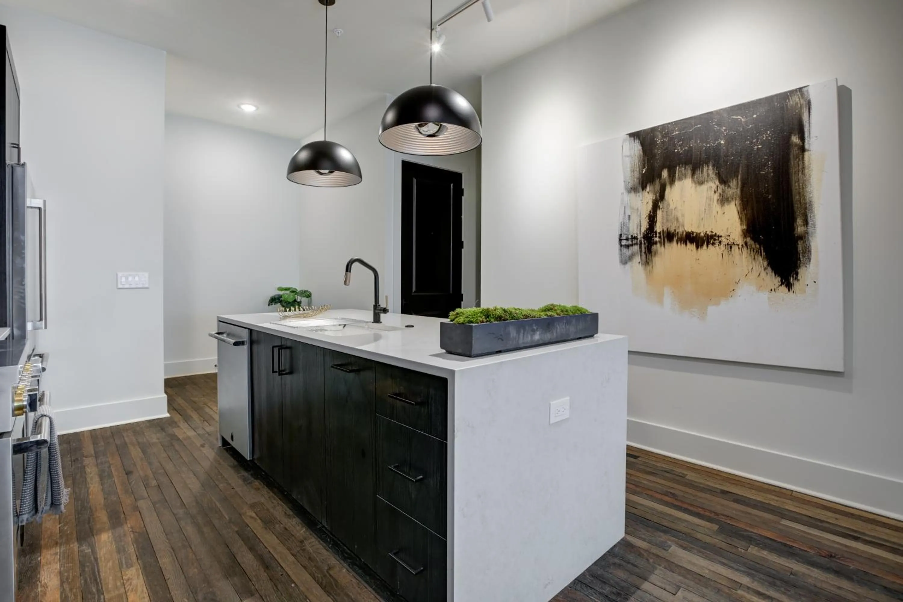 kitchen in Loft condo by Mercedes Benz w balcony Apt 101