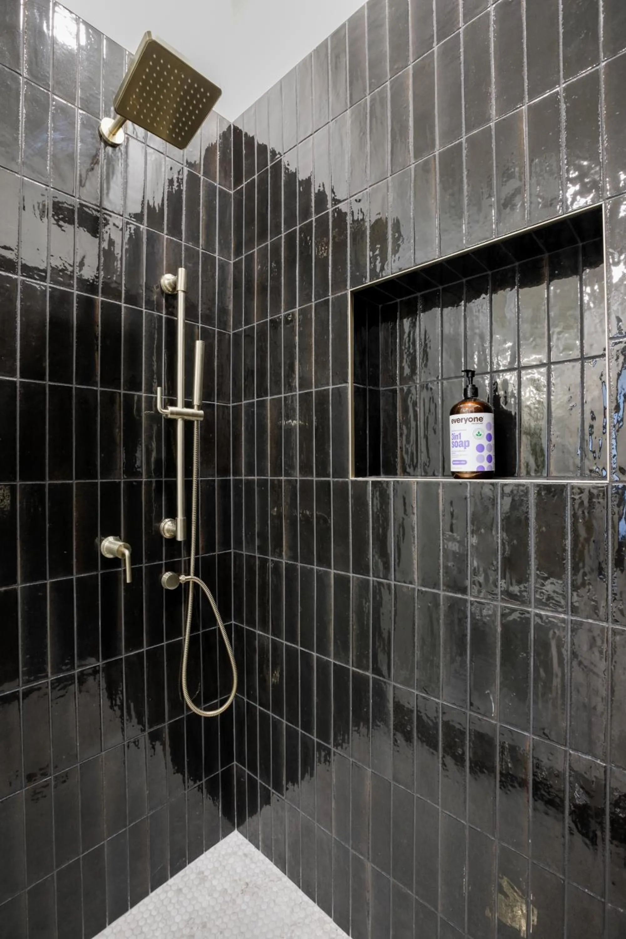 Shower in Loft condo by Mercedes Benz w balcony Apt 101