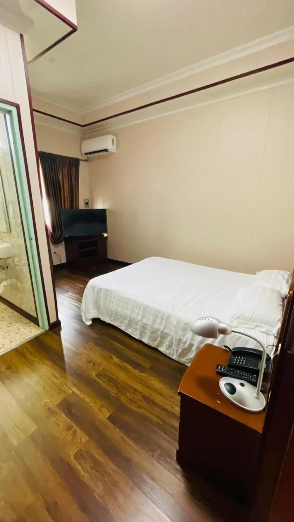 Bed in CHINA STAR HOTEL