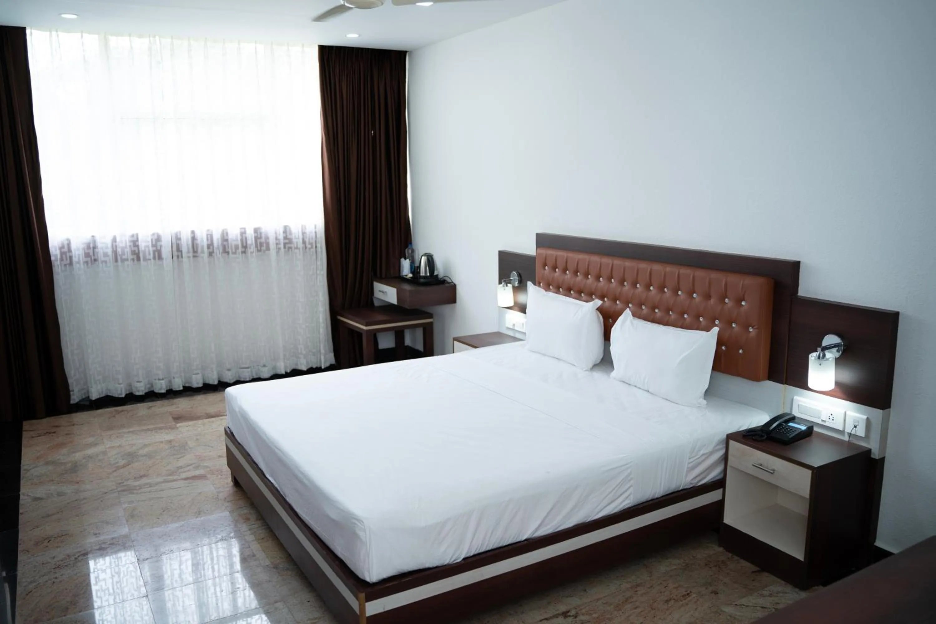 Bed in Hotel Idukki Castle