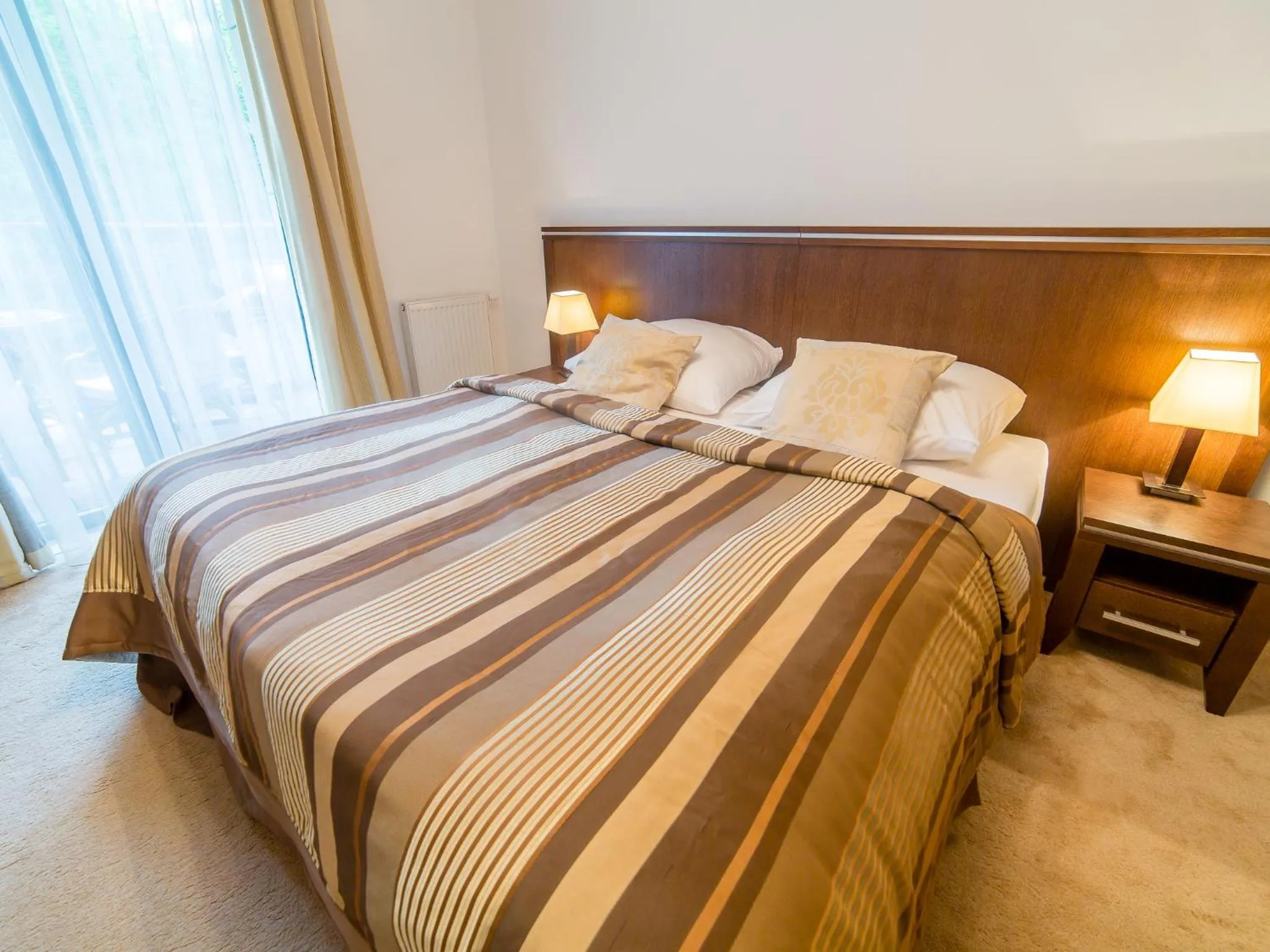 Bed in Diune Apartment