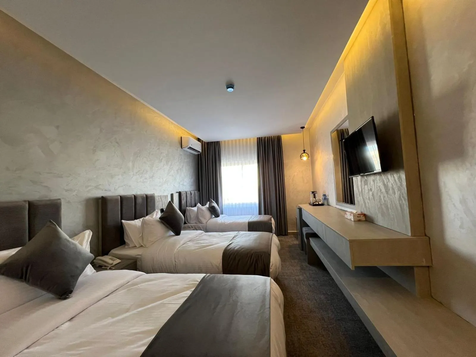 Bed in Kaya Hotel Amman