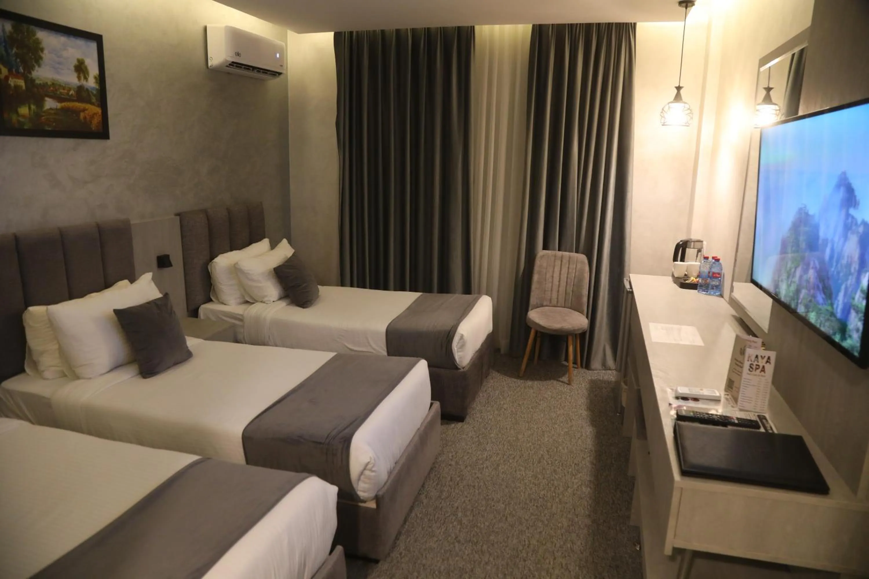 Bed in Kaya Hotel Amman