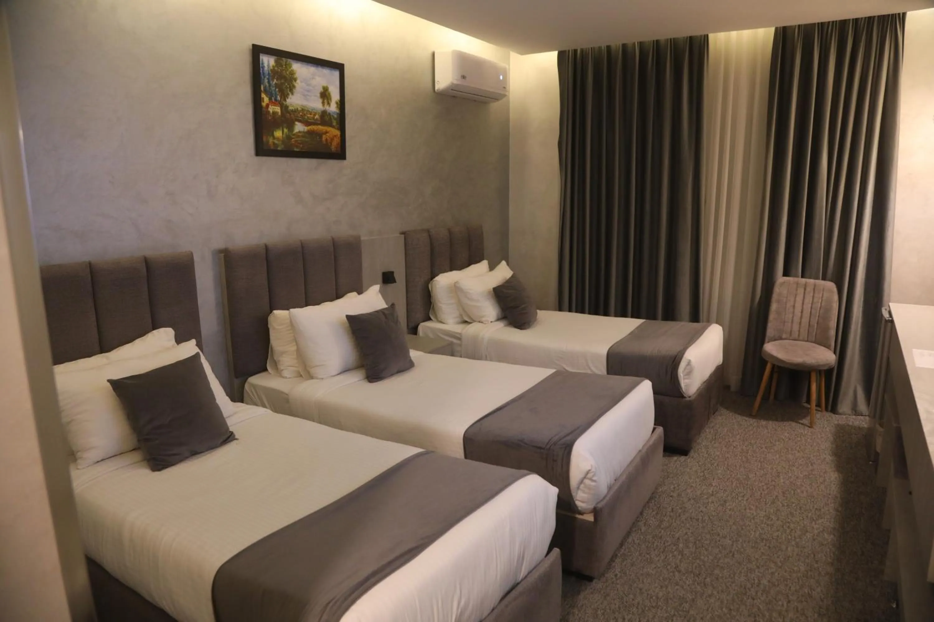 Bed in Kaya Hotel Amman