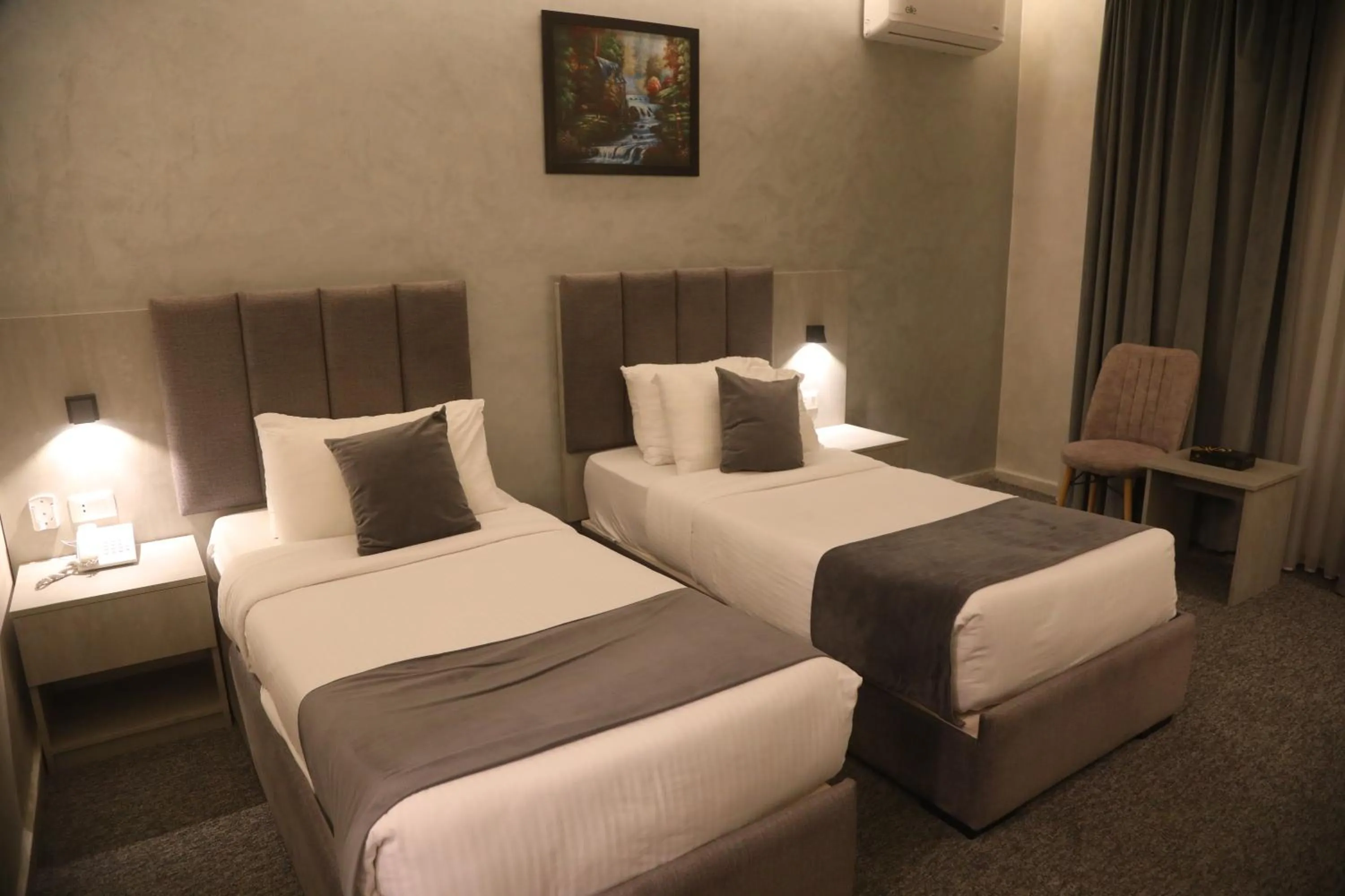 Bed in Kaya Hotel Amman