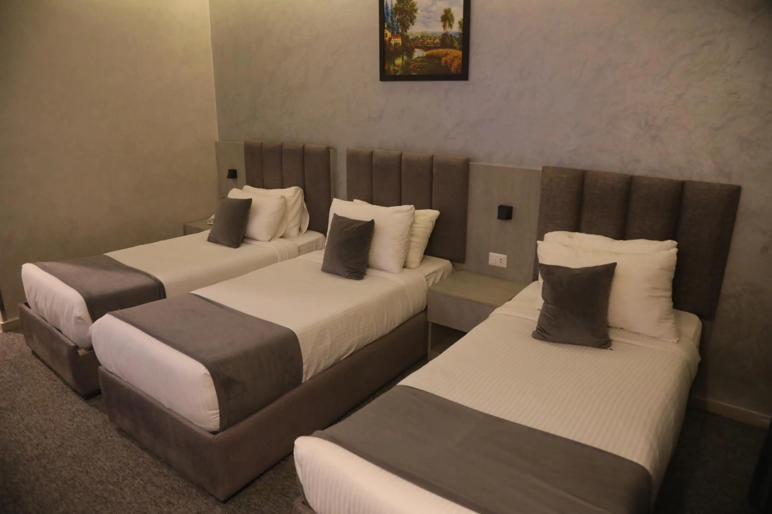 Bed in Kaya Hotel Amman