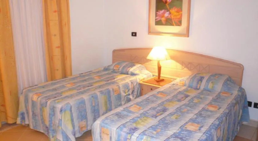 Bed in Logaina Sharm Resort Apartments