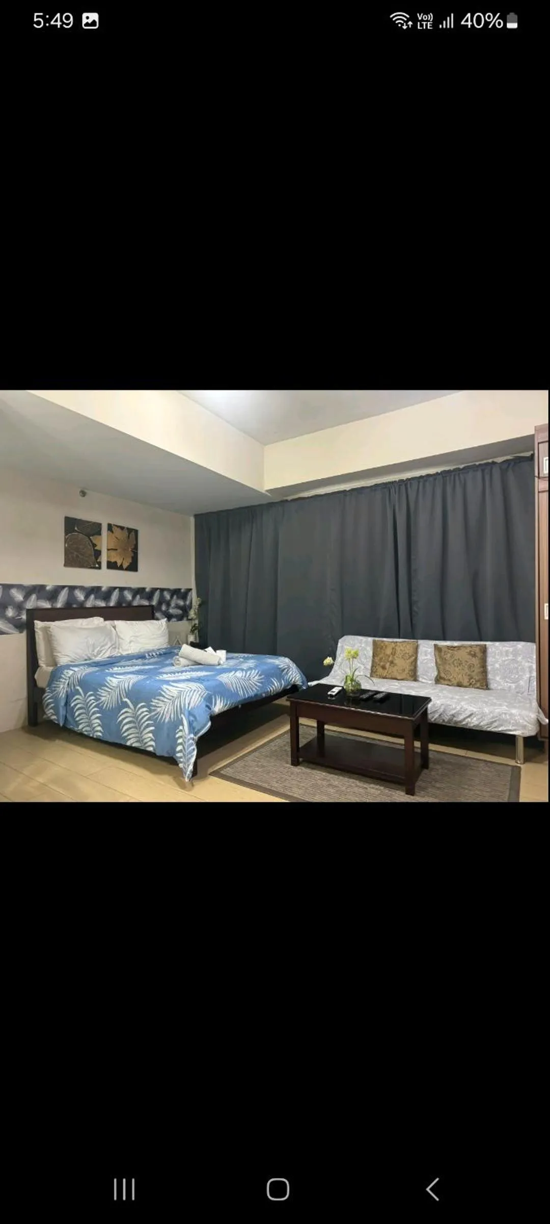 Bed in Henry's Newport Condotel