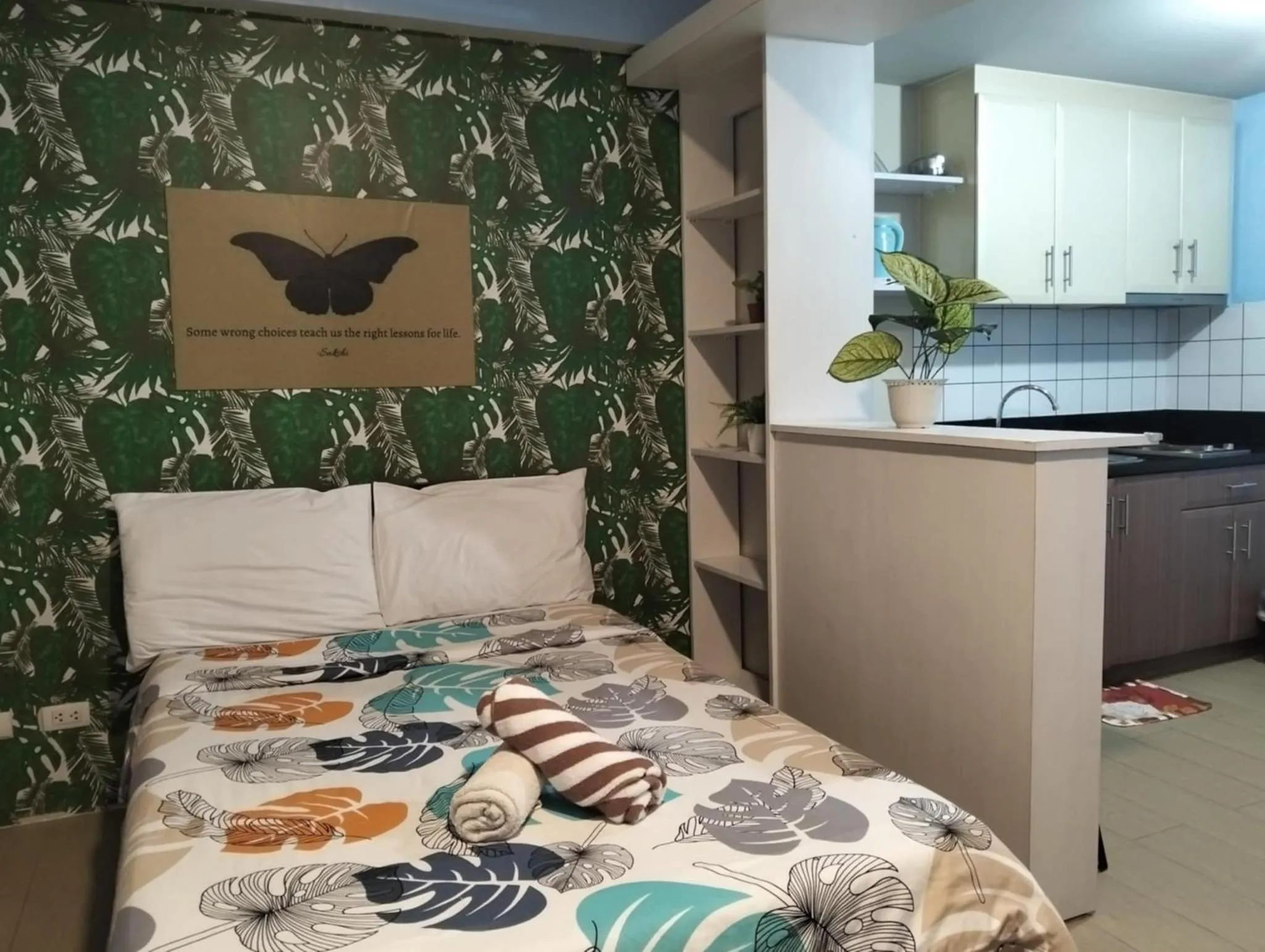 Bed in Henry's Newport Condotel