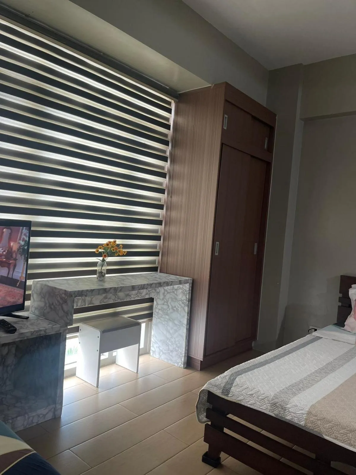 Bed in Henry's Newport Condotel