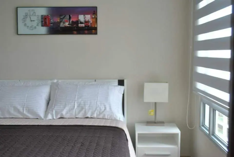 Bed in Henry's Newport Condotel Bed in Henry's Newport Condotel