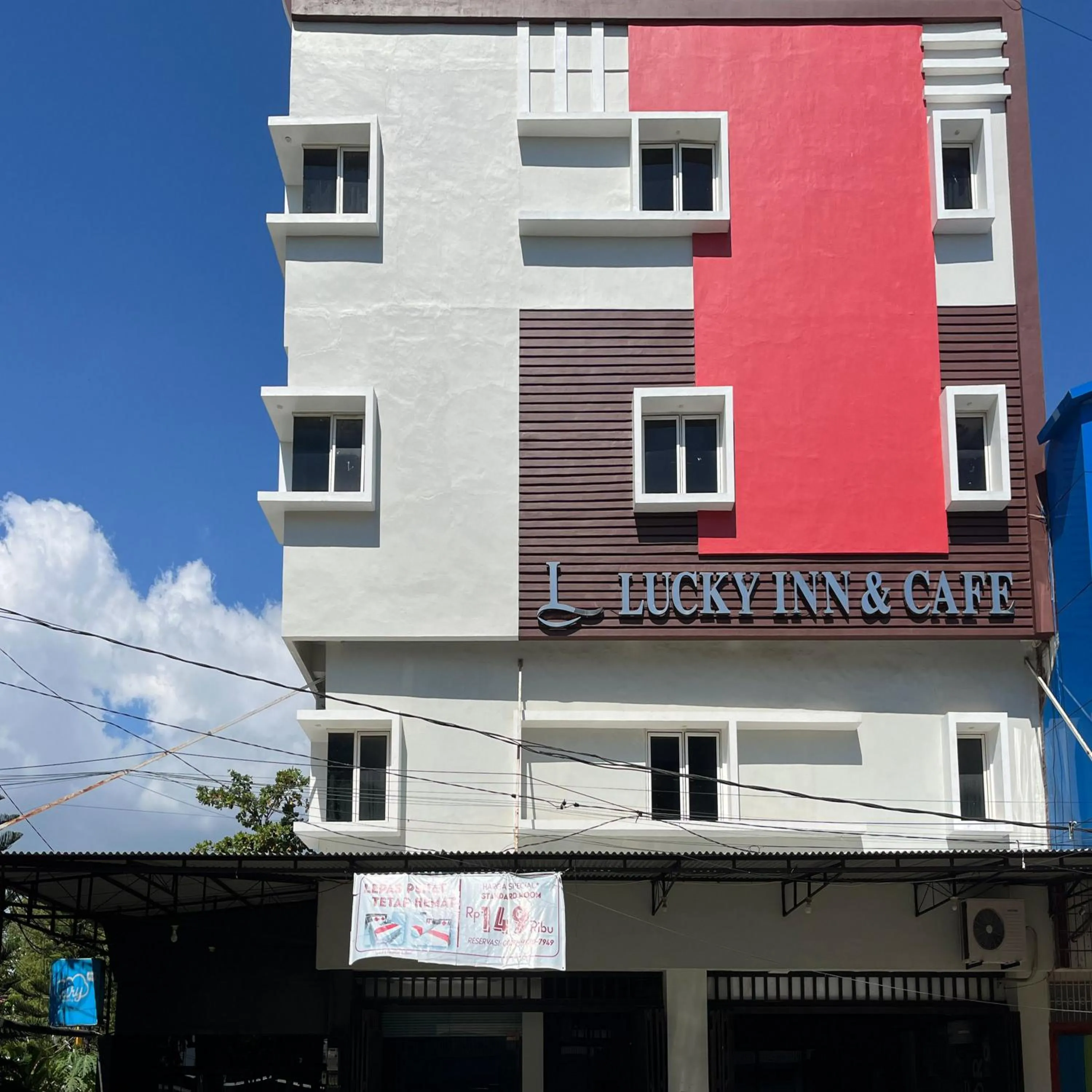 Facade/entrance in RedDoorz at Lucky Inn Panakukkang Makassar