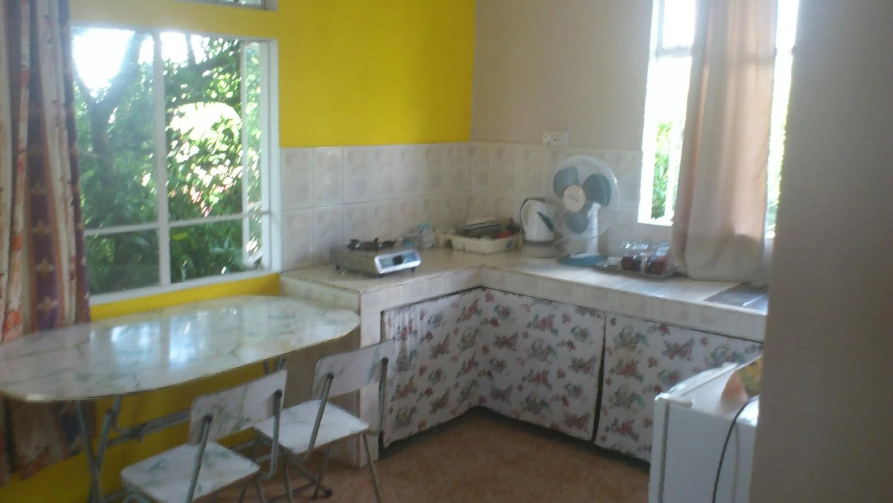 Kitchen or kitchenette in Residence Les Bambous