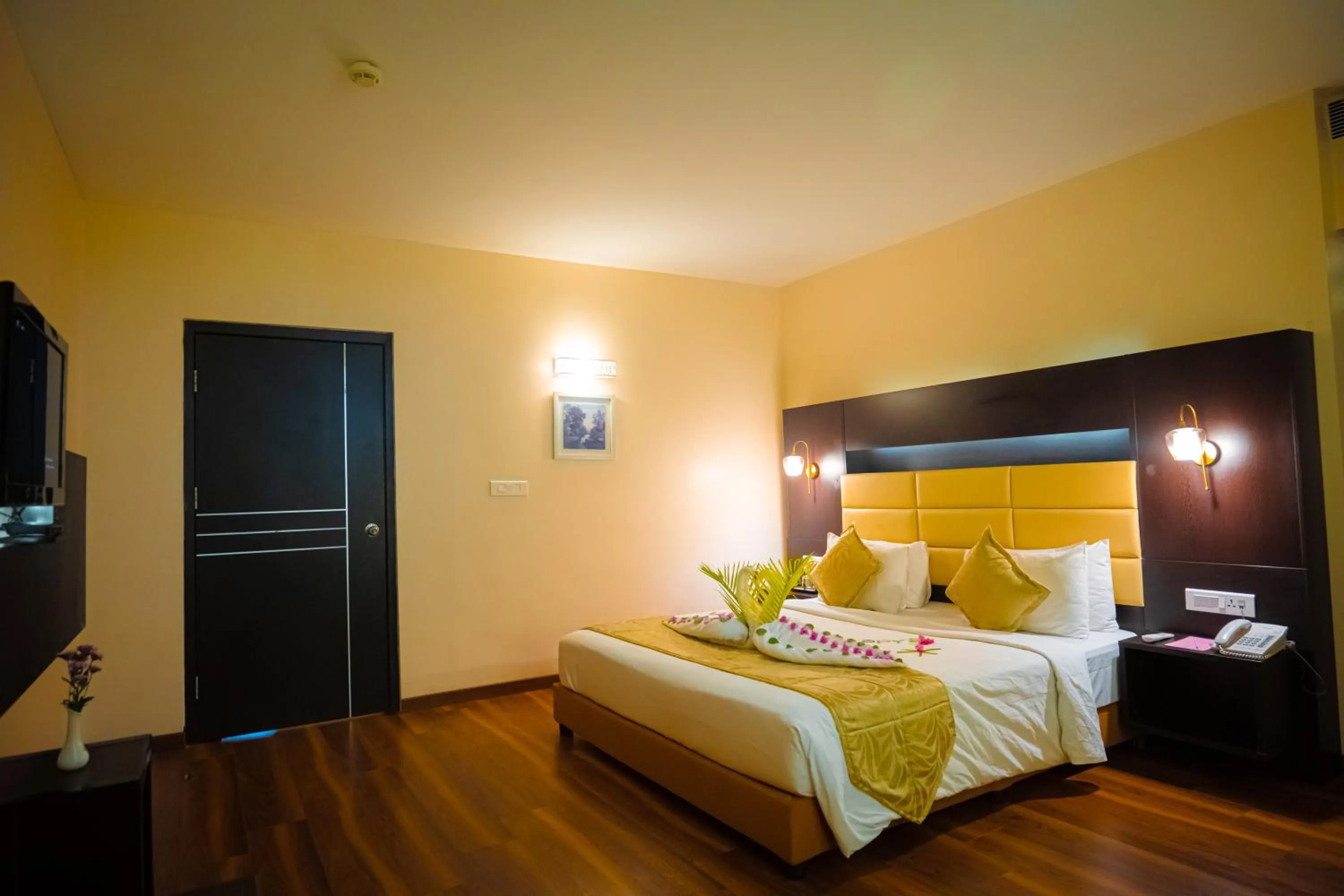 Bed in Poppys Hotel Madurai