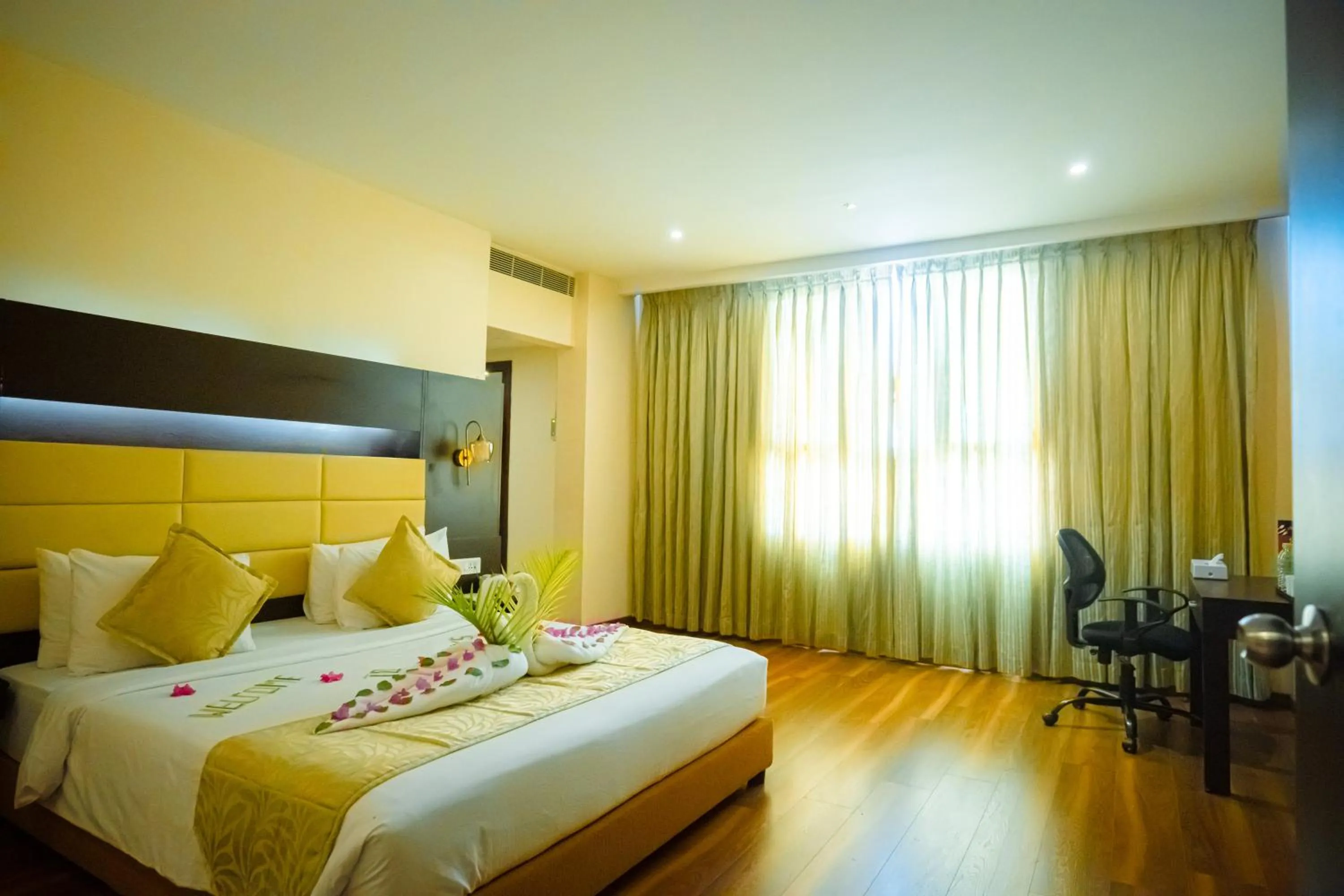 Photo of the whole room, Bed in Poppys Hotel Madurai