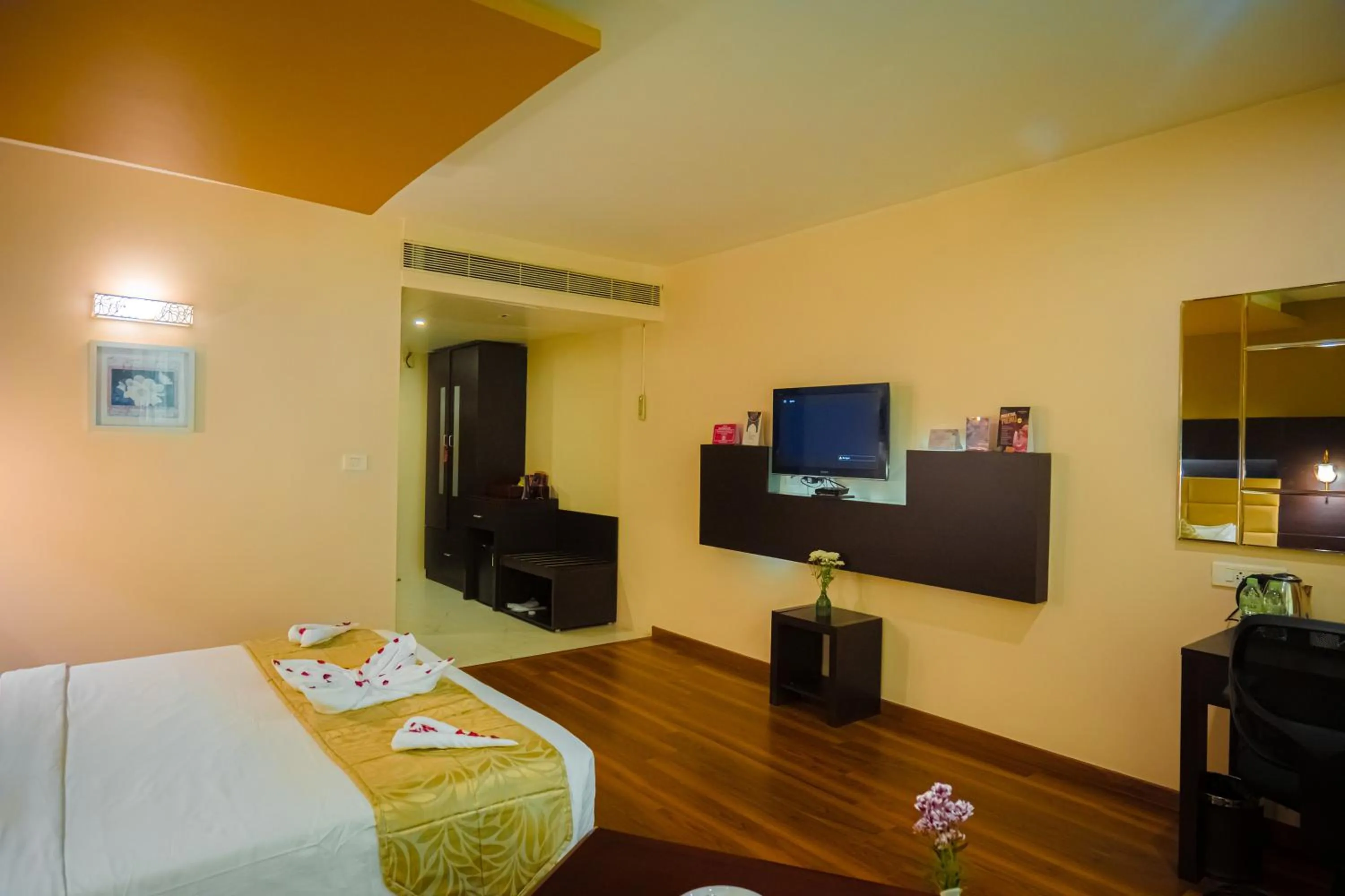 Bed in Poppys Hotel Madurai