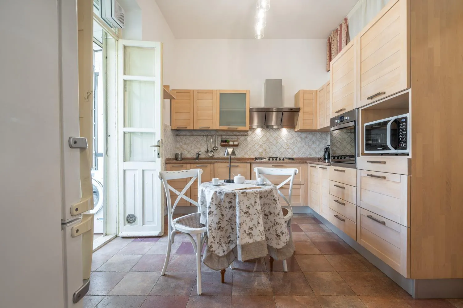 Kitchen or kitchenette in Greta House San Benedetto