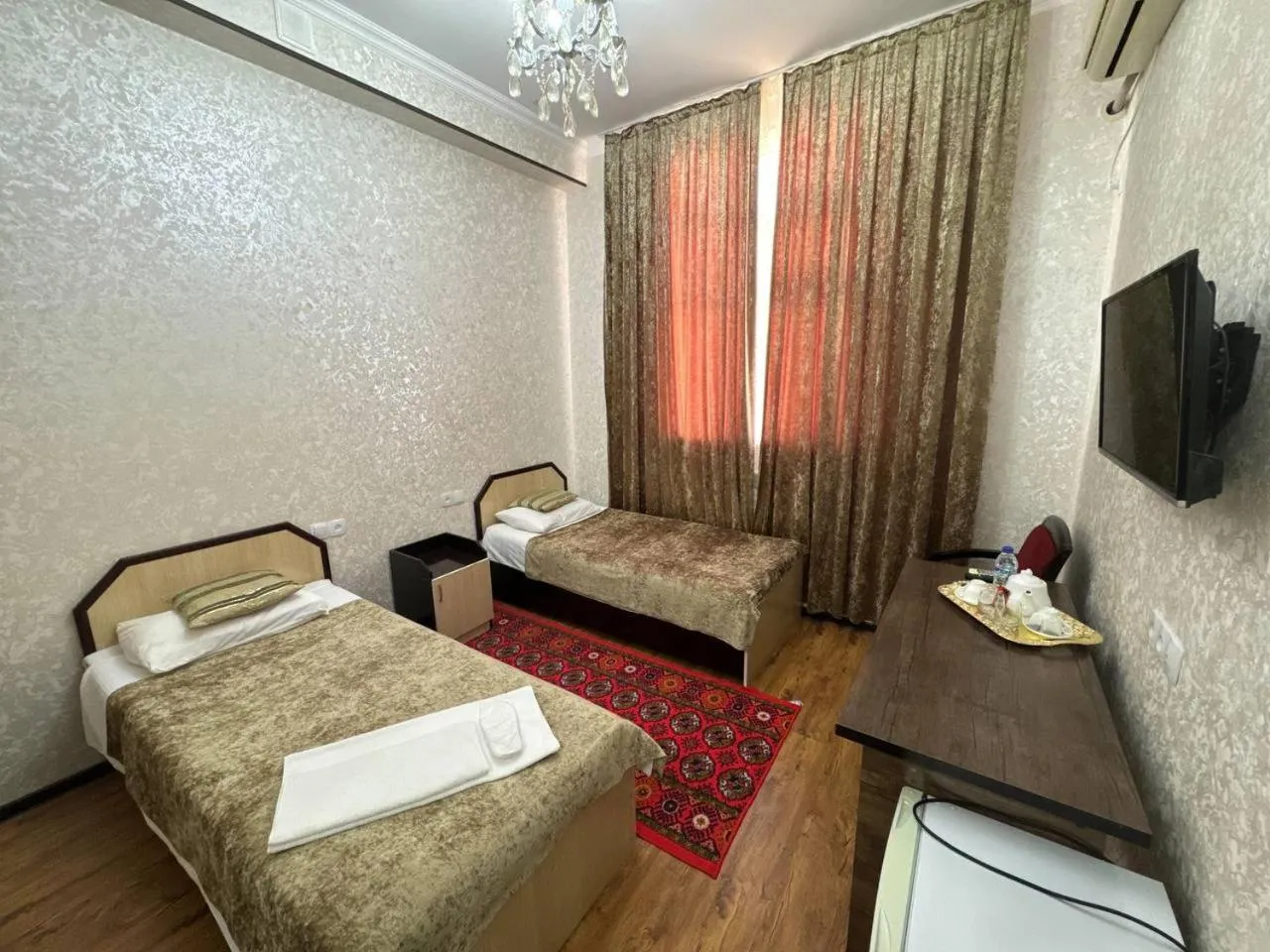 Bed in RATMINA HOTEL