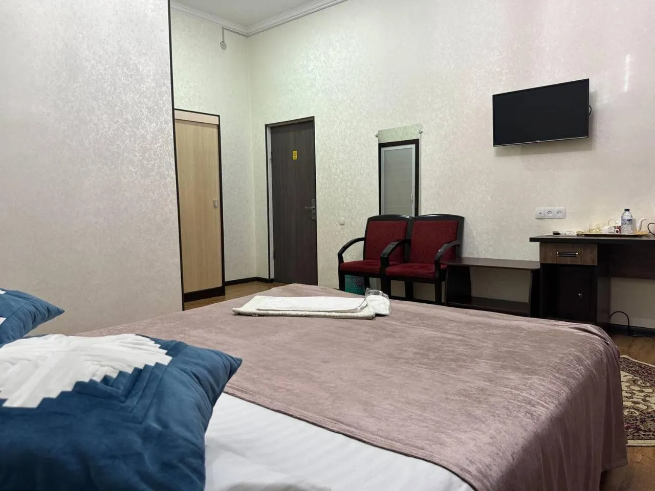 Bed in RATMINA HOTEL