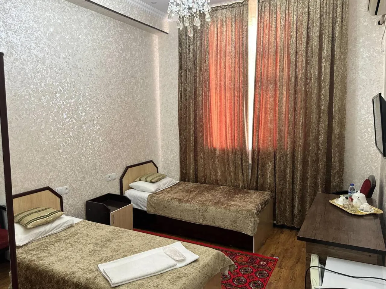 Bed in RATMINA HOTEL