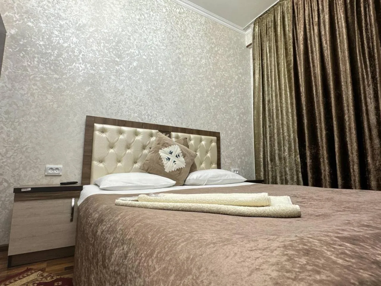 Bed in RATMINA HOTEL