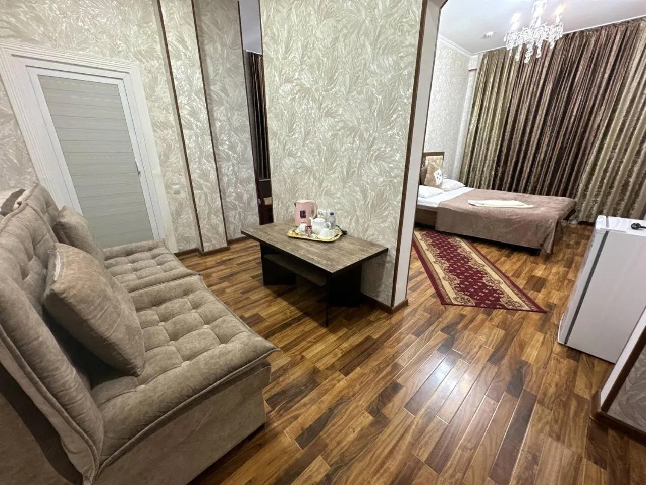 Living room, Bed in RATMINA HOTEL