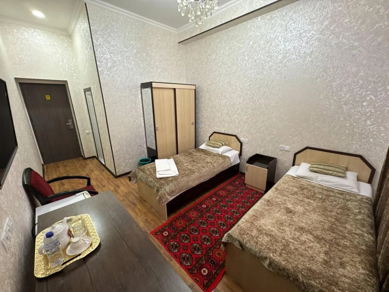 Bed in RATMINA HOTEL