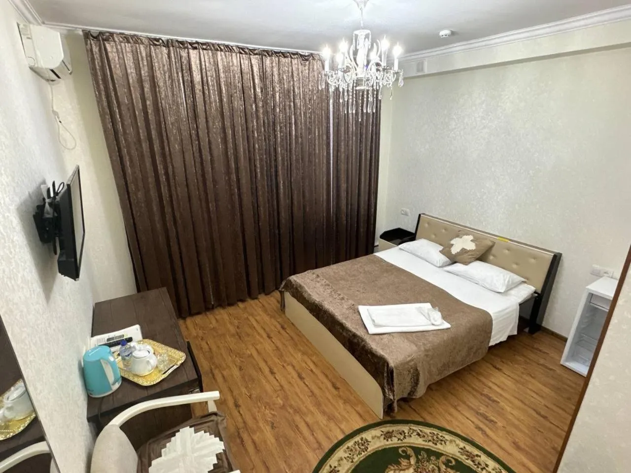 Bed in RATMINA HOTEL