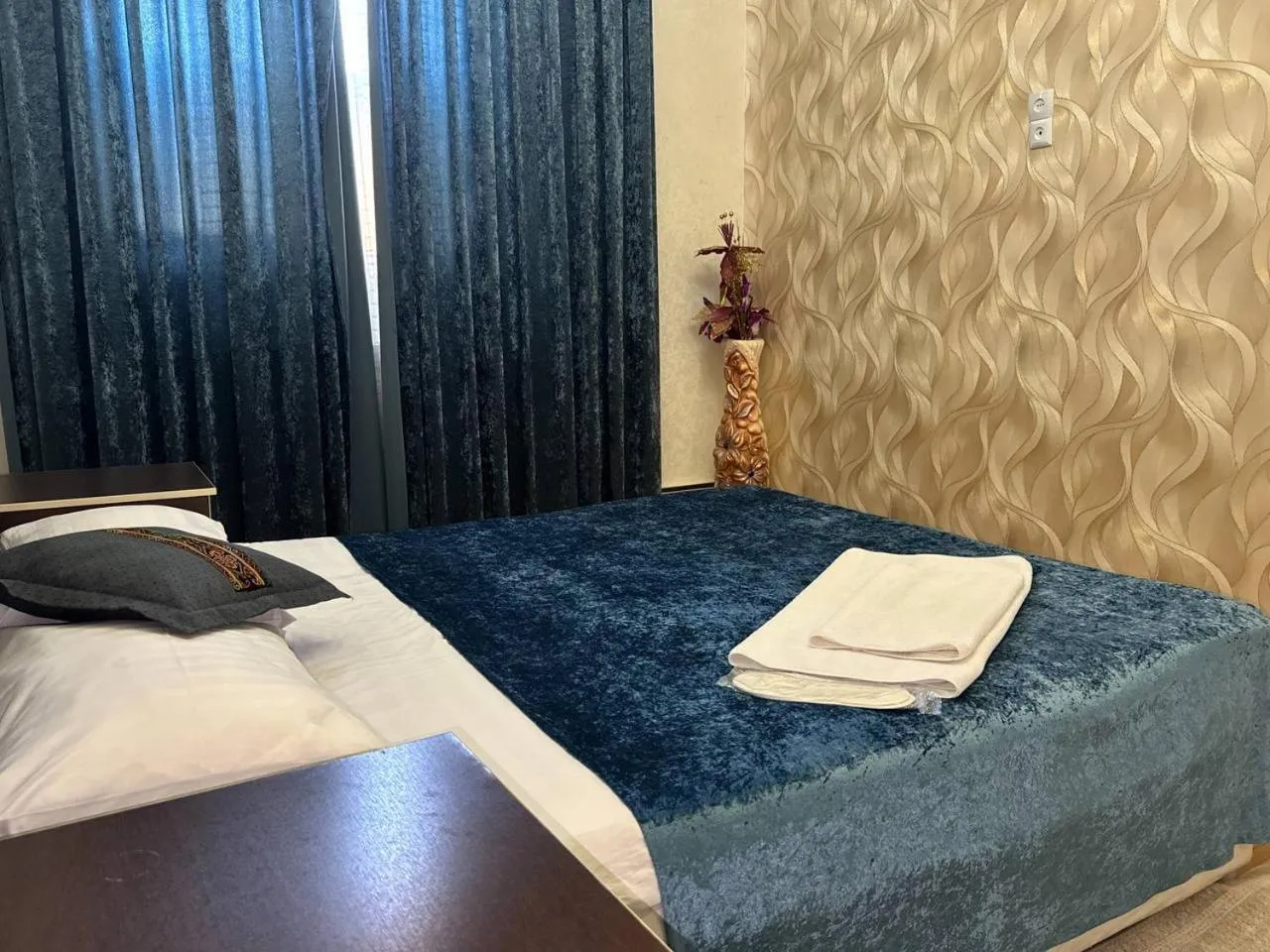 Bed in RATMINA HOTEL