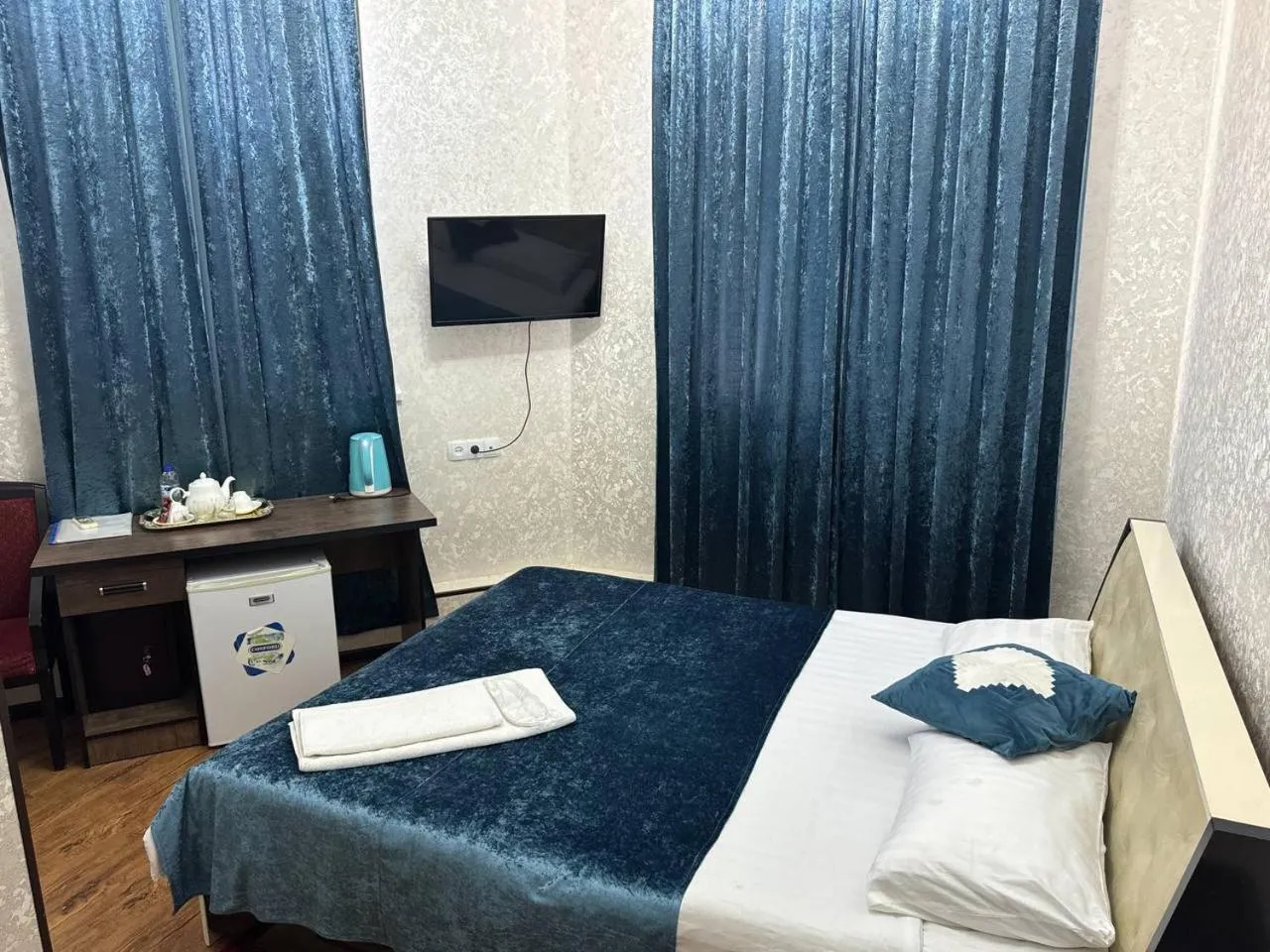 Bed in RATMINA HOTEL