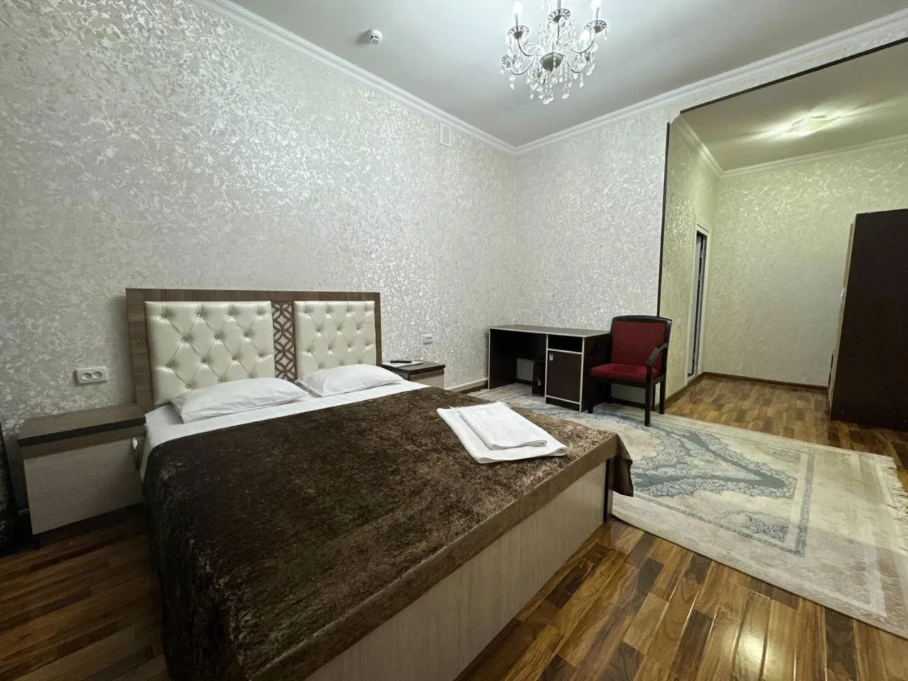 Bed in RATMINA HOTEL